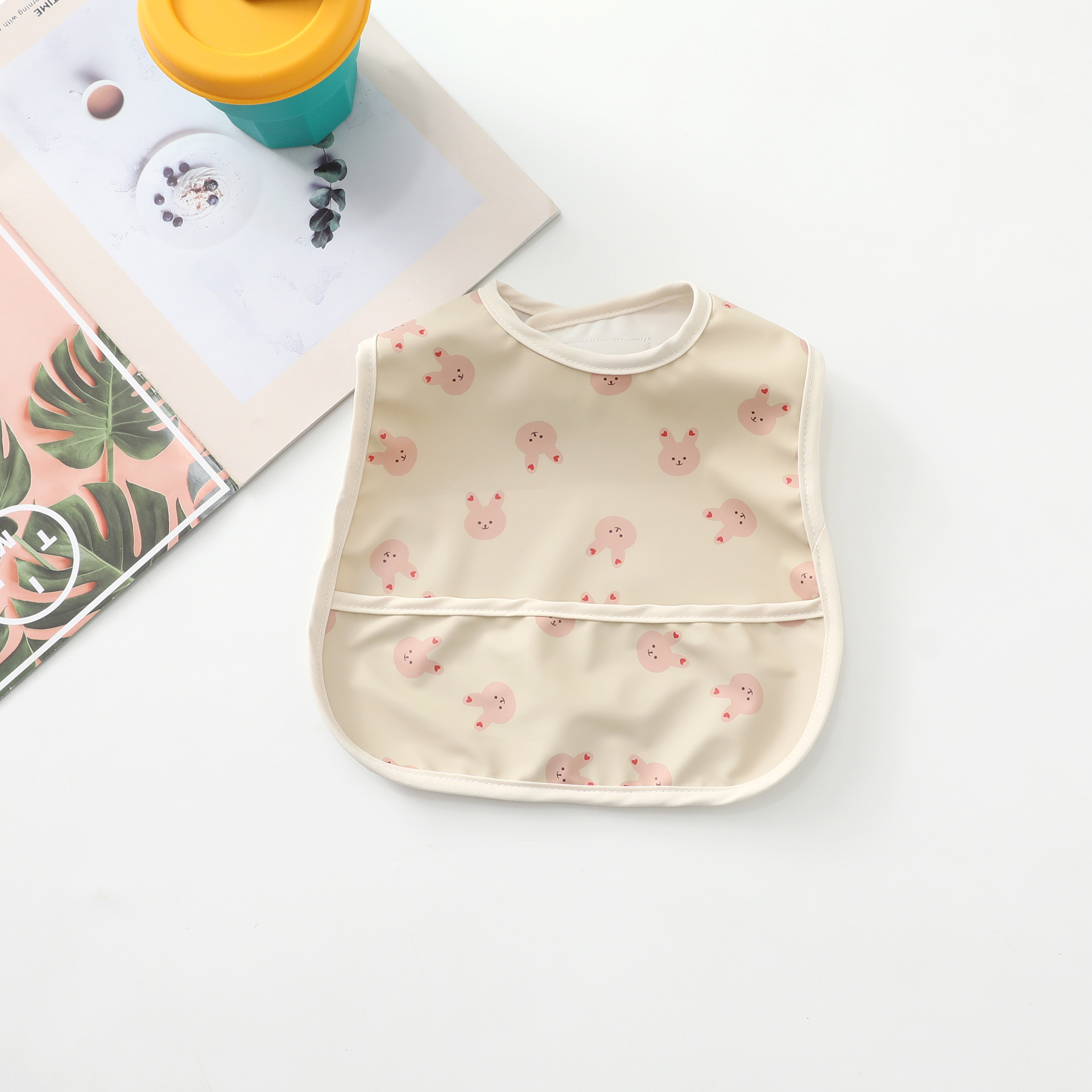 Yếm ăn dặm cho bé có máng hứng phong cách Hàn Quốc chất liệu da PU chống thấm nước, dễ giặt, hoạ tiết dễ thương