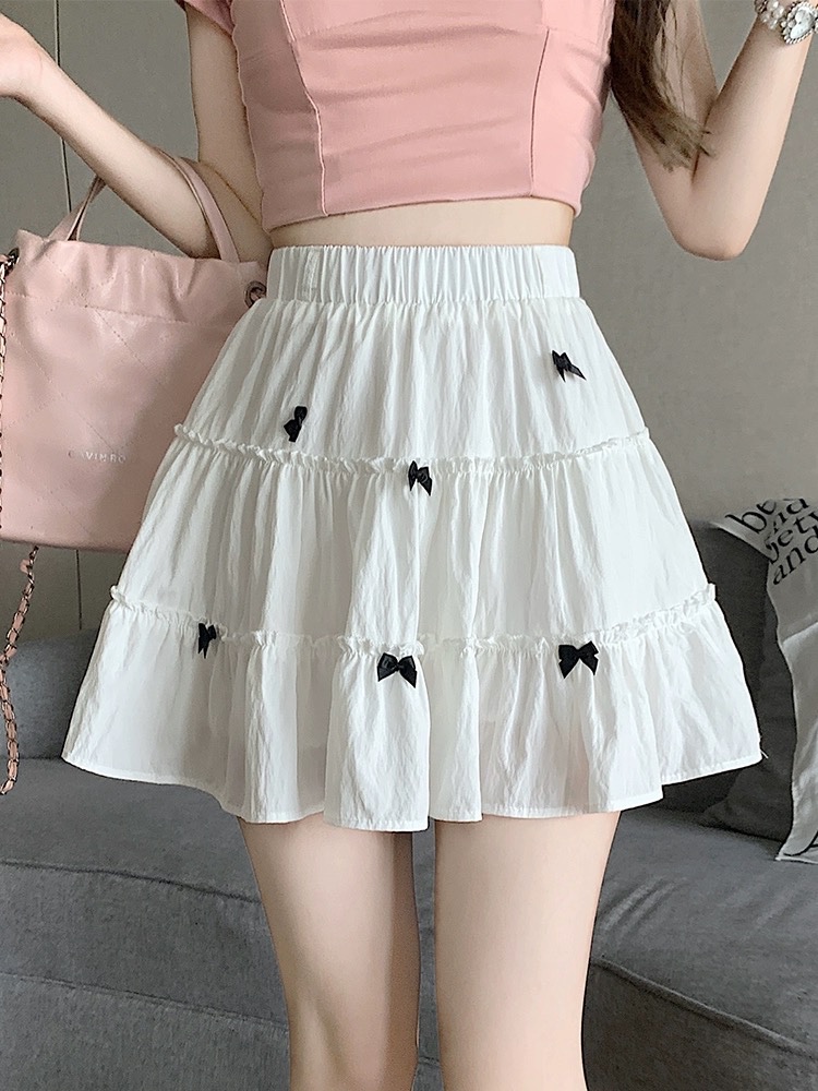 CHÂN VÁY ĐÍNH NƠ NỔI ĐEN TRẮNG QC