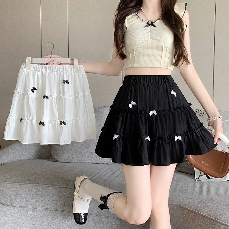 CHÂN VÁY ĐÍNH NƠ NỔI ĐEN TRẮNG QC