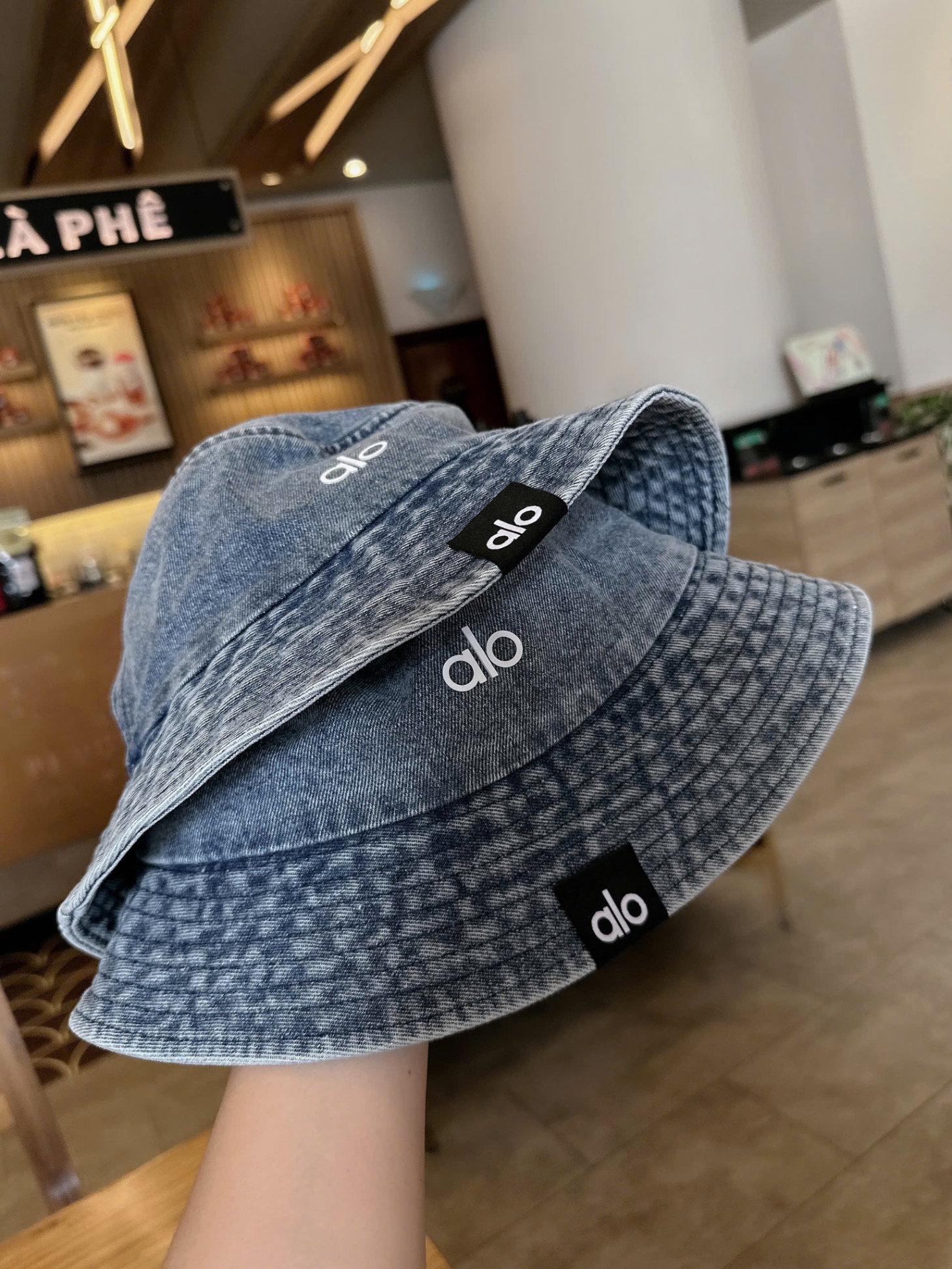 MŨ BÒ DENIM TRÒN QCCC CHỮ ALO