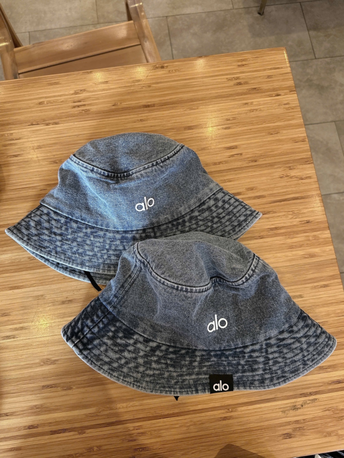 MŨ BÒ DENIM TRÒN QCCC CHỮ ALO