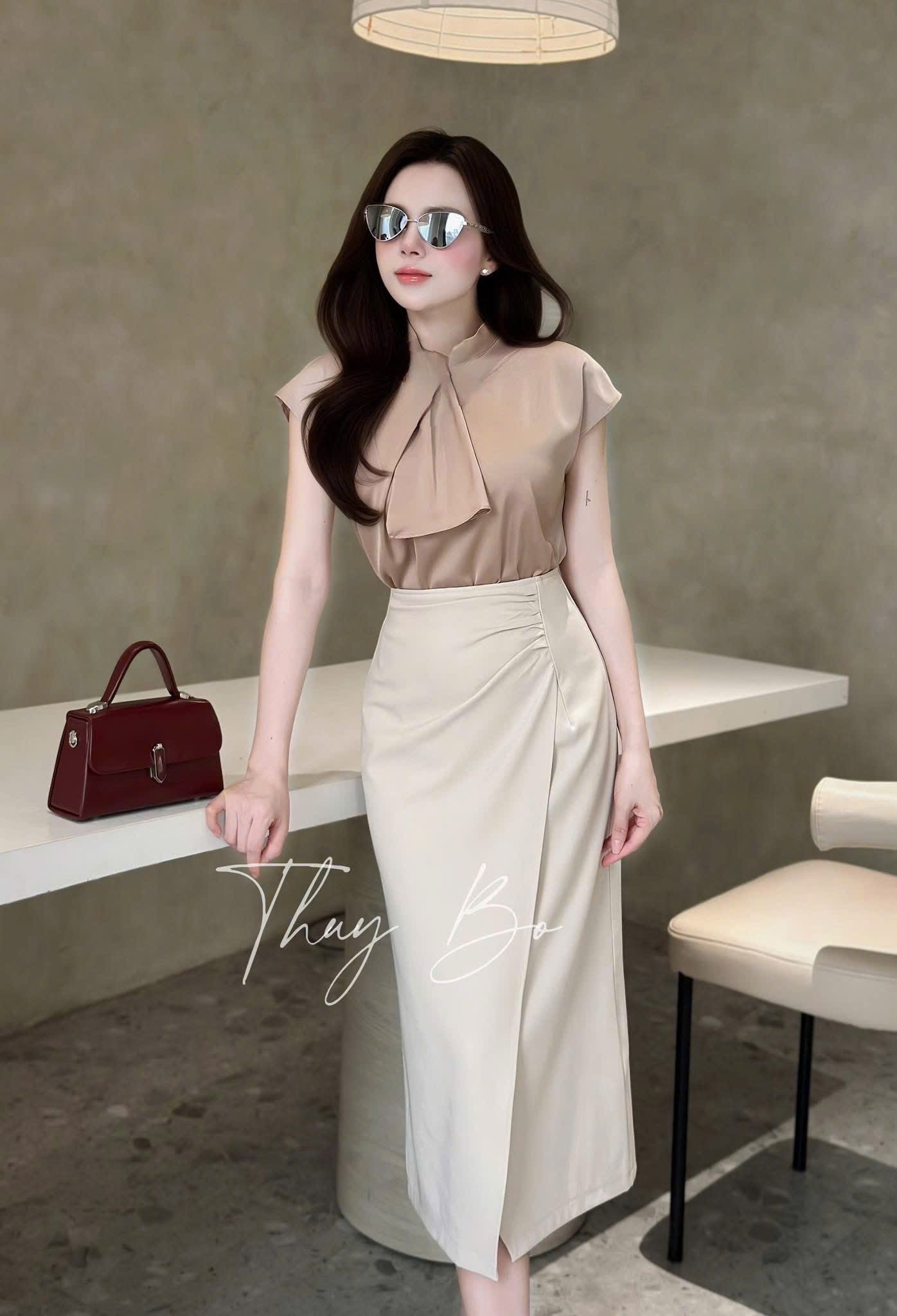 AO SƠ MI GU TAY LIỀN NƠ CỔ ĐỎ BE