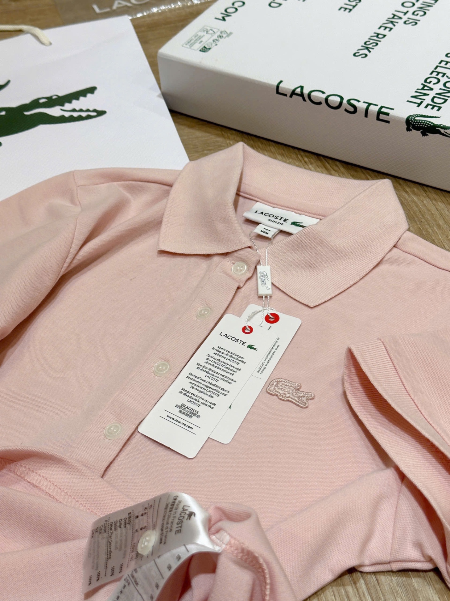 Hang nha may - ÁO POLO LCT HỒNG XUẤT DƯ