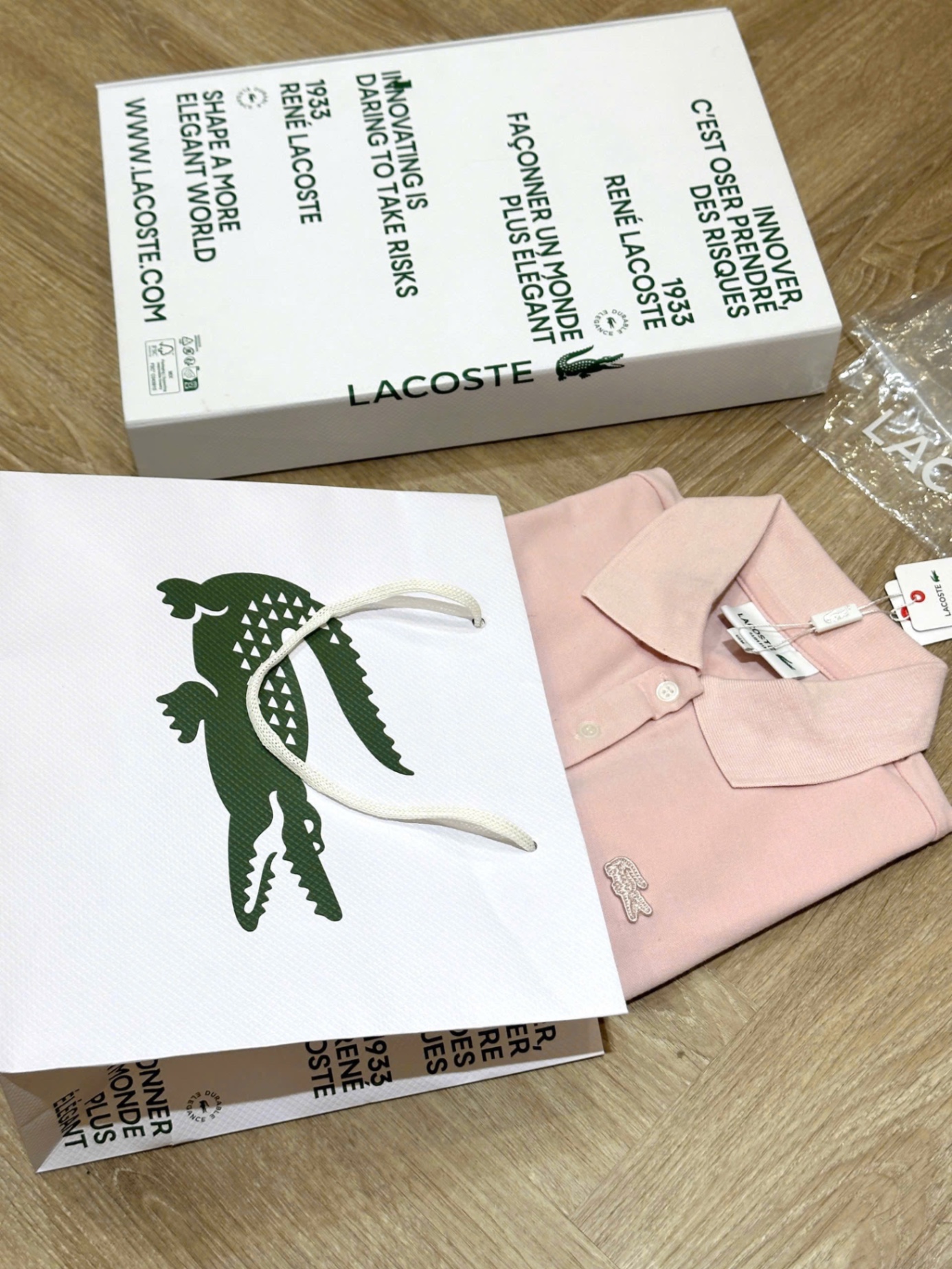 Hang nha may - ÁO POLO LCT HỒNG XUẤT DƯ