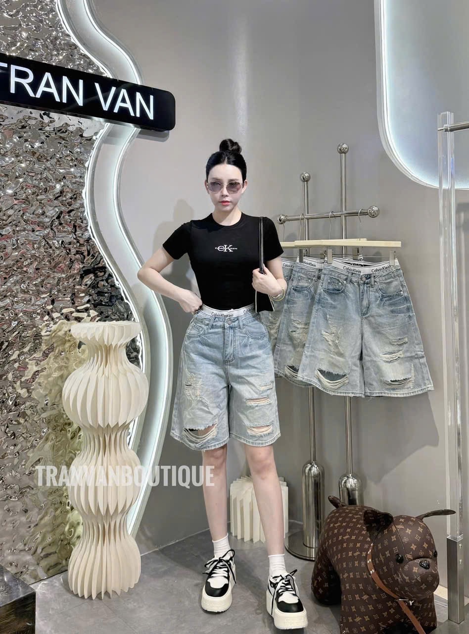 QUẦN JEAN NGỐ XANH RÁCH CẠP CAVIN M1122