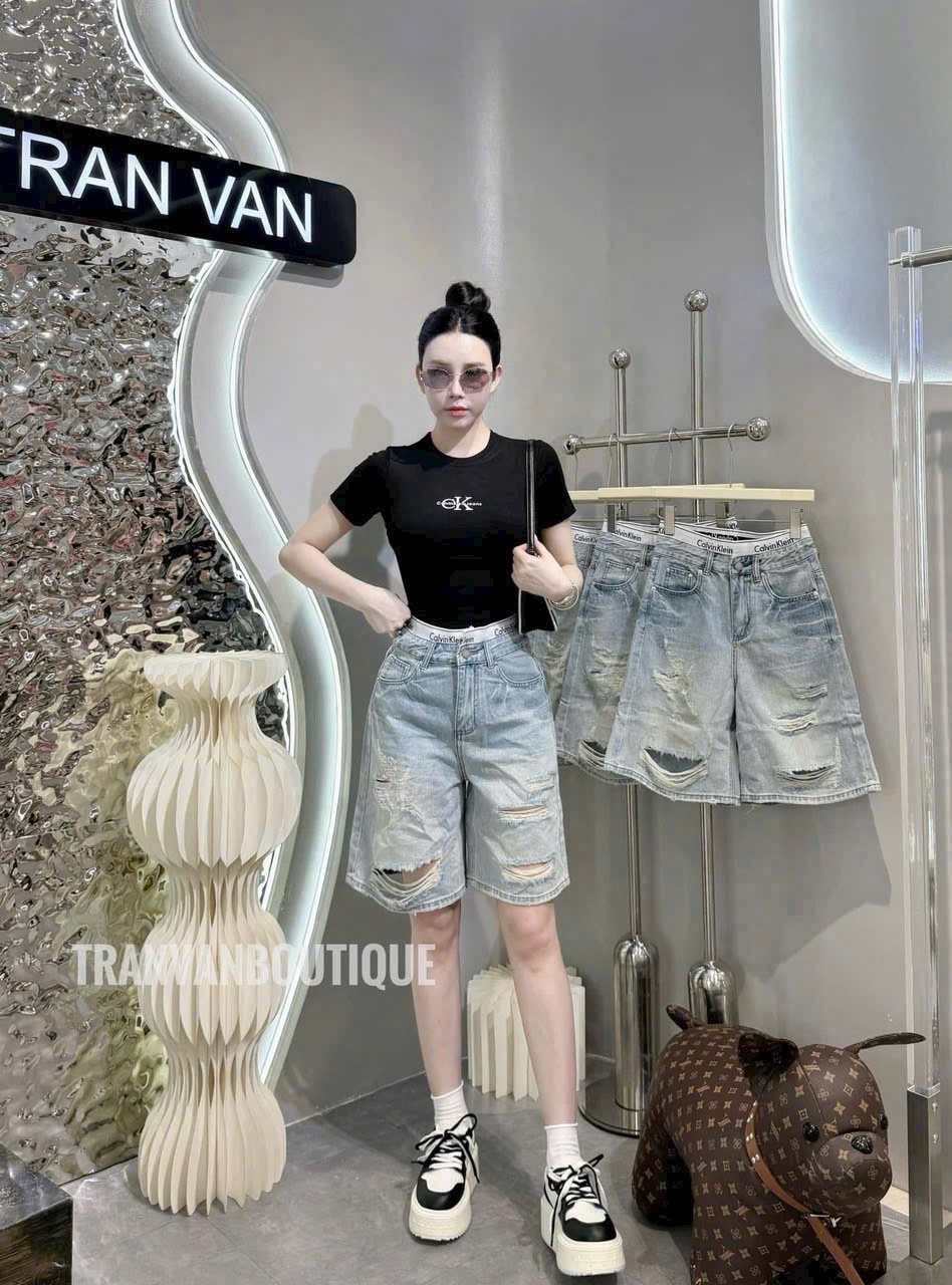 QUẦN JEAN NGỐ XANH RÁCH CẠP CAVIN M1122