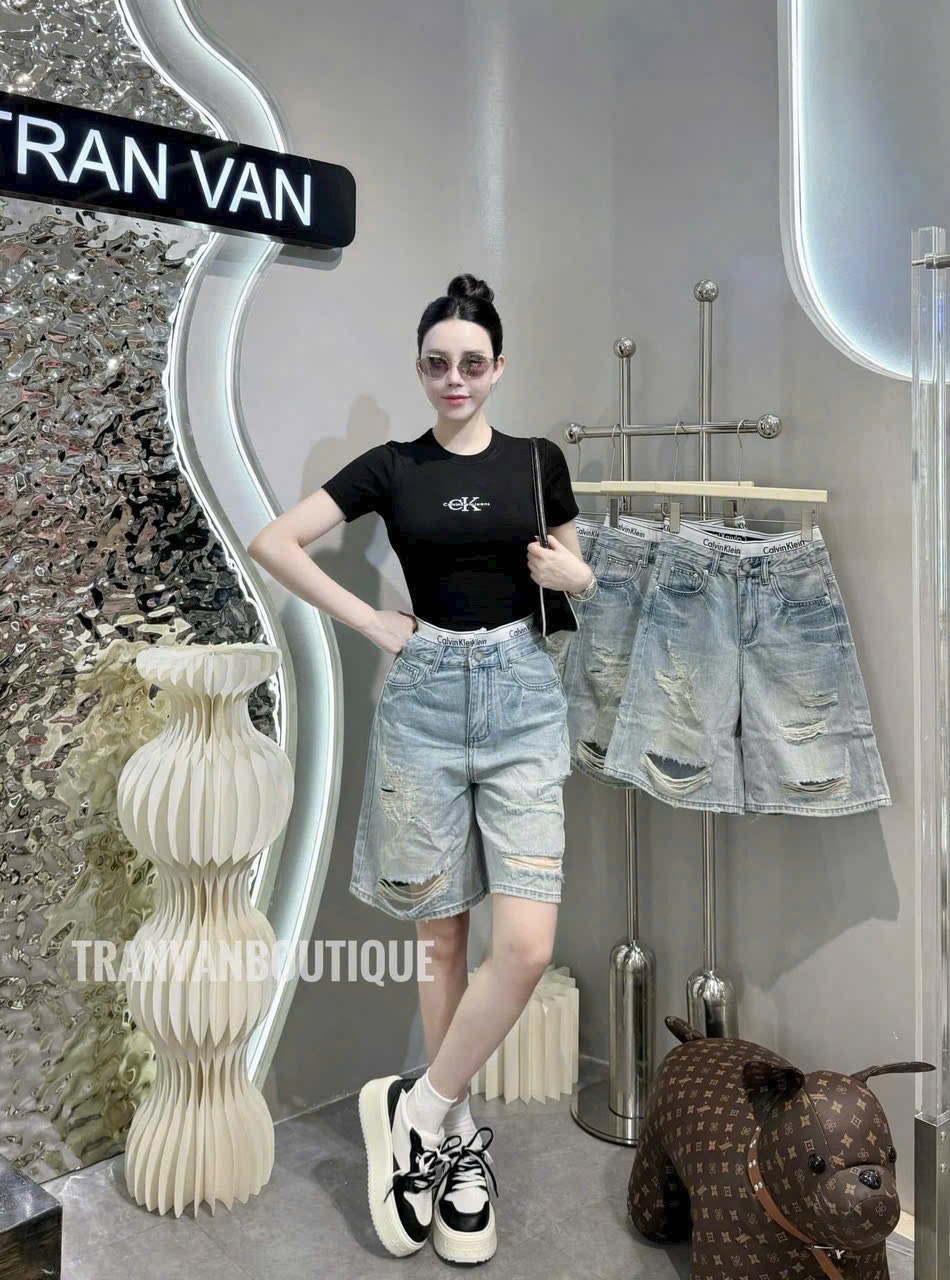 QUẦN JEAN NGỐ XANH RÁCH CẠP CAVIN M1122