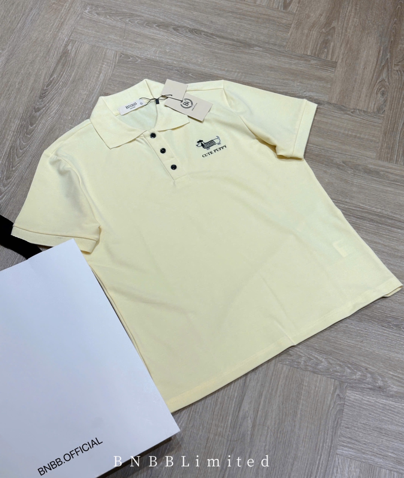 ÁO POLO CỘC VÀNG THÊU CÚN BNBB