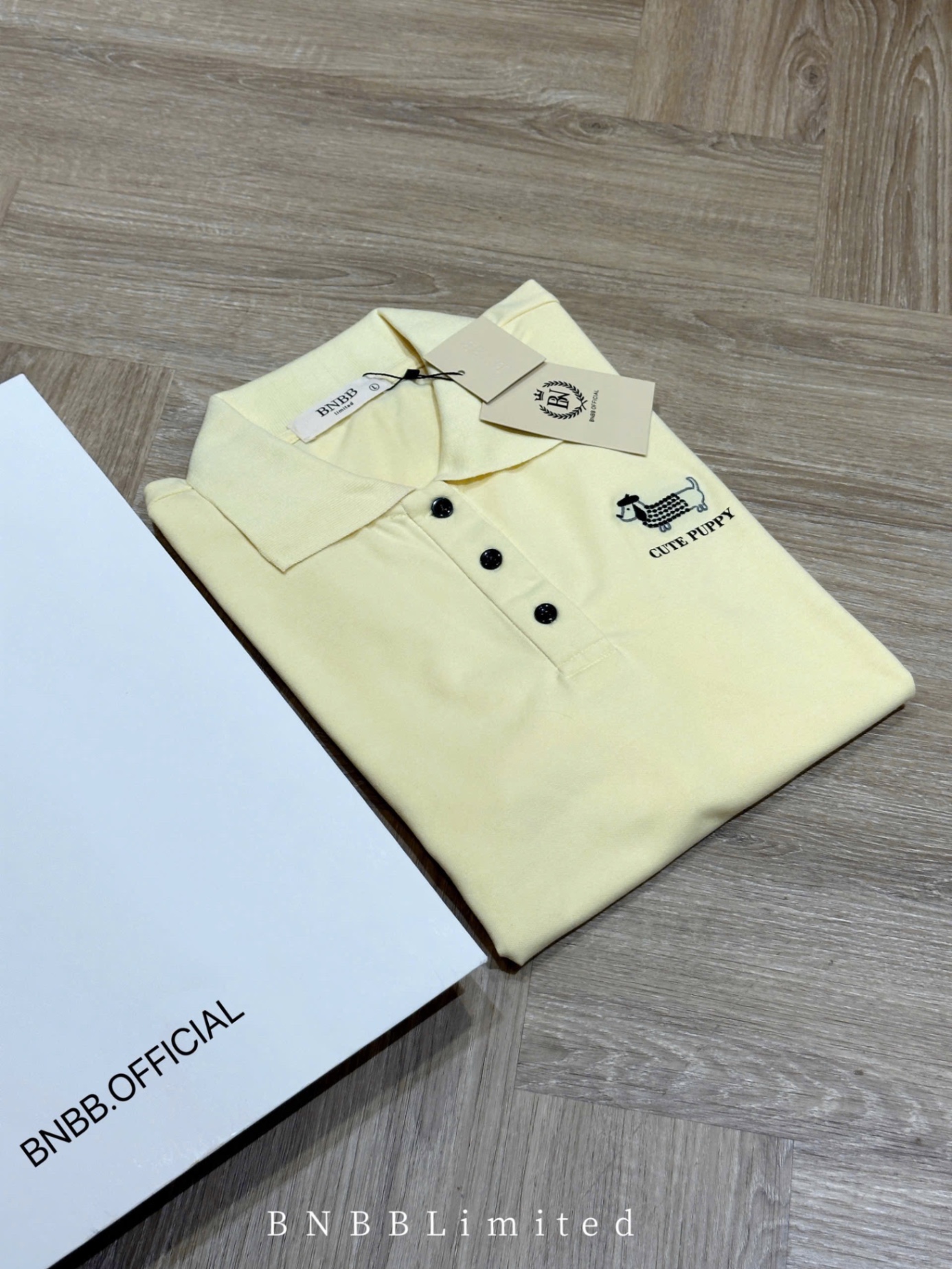 ÁO POLO CỘC VÀNG THÊU CÚN BNBB
