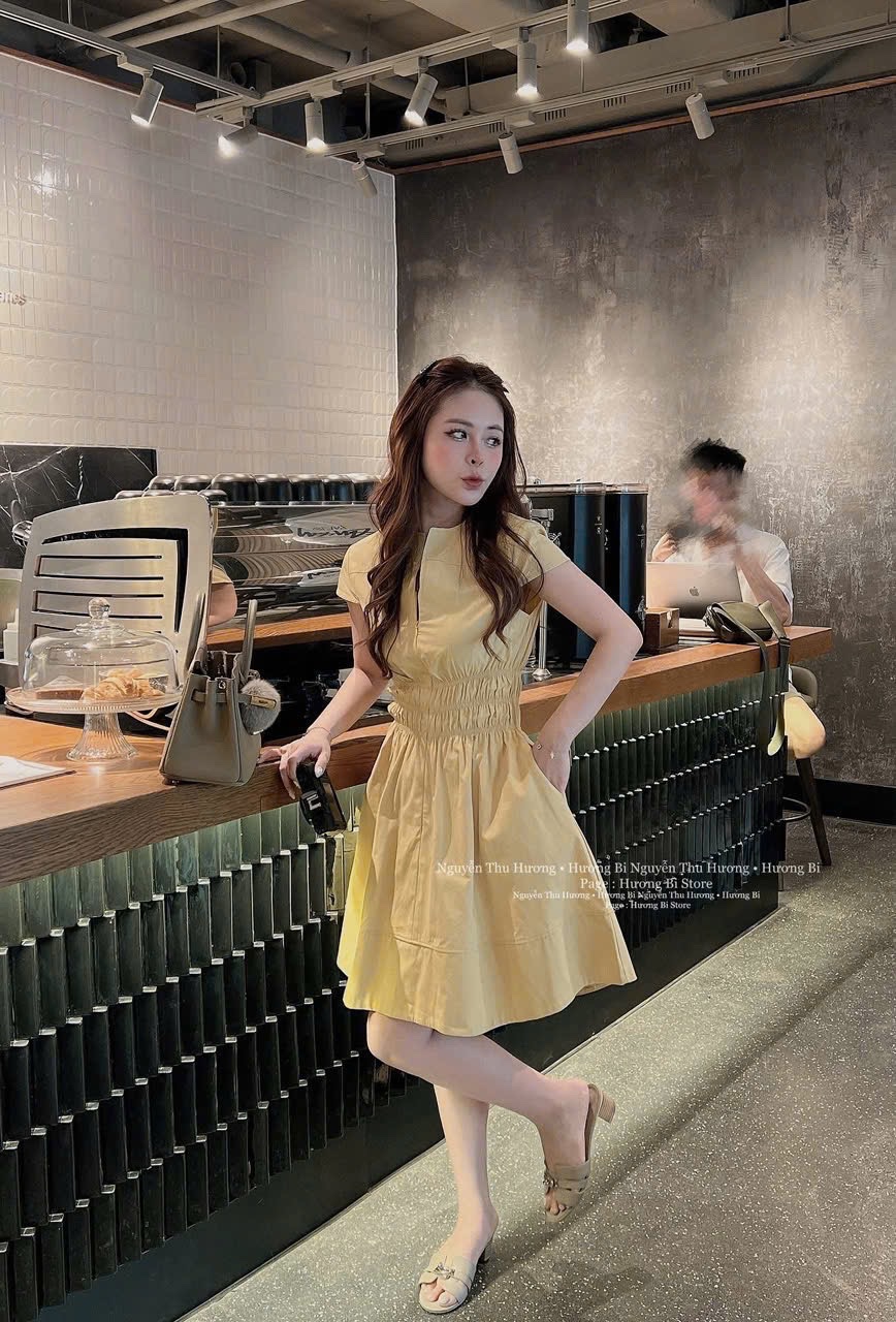 VÁY XOÈ VÀNG CHUN EO NỮ