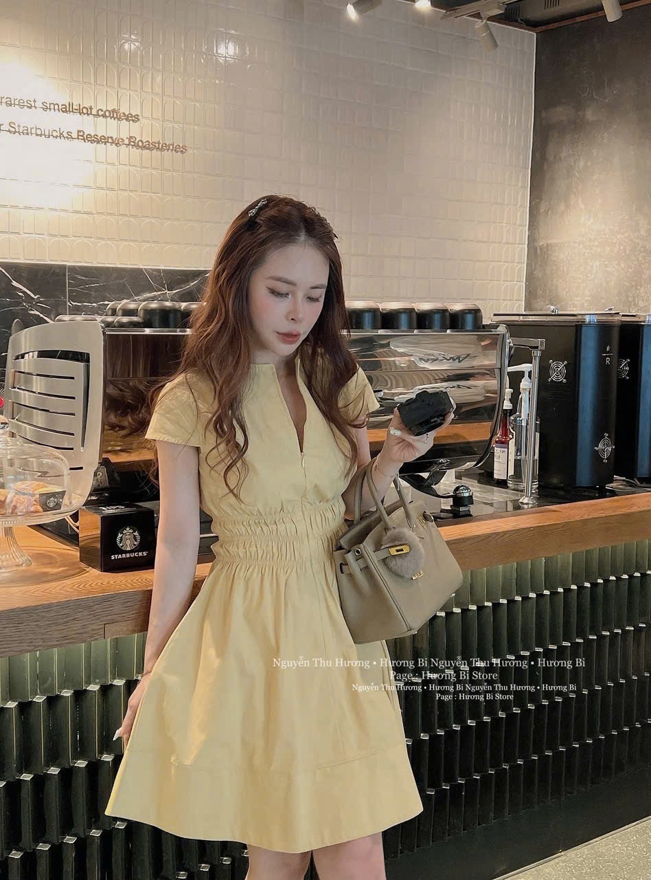 VÁY XOÈ VÀNG CHUN EO NỮ