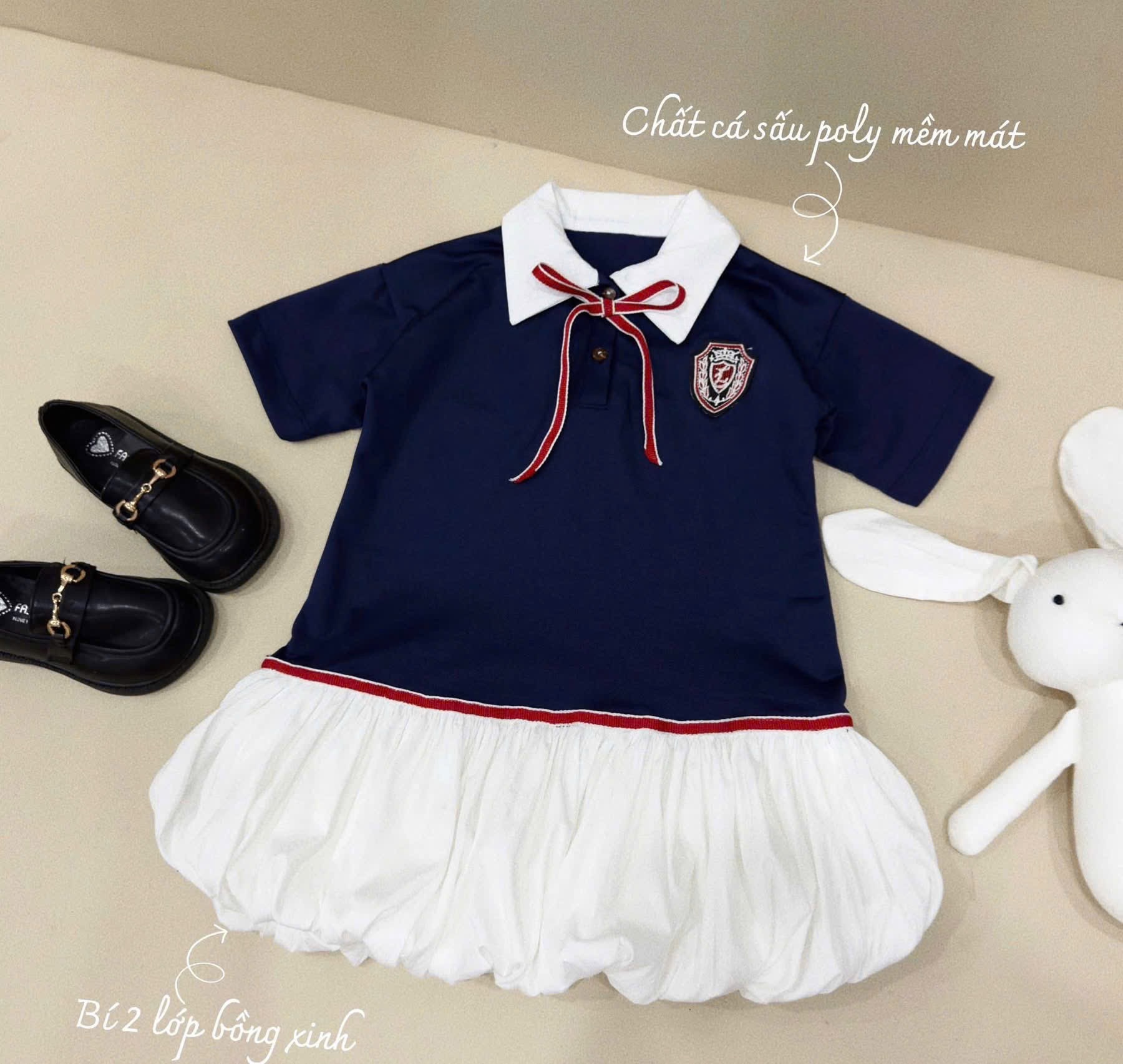 VÁY POLO THAN PHỐI TRẮNG HUY HIỆU BG