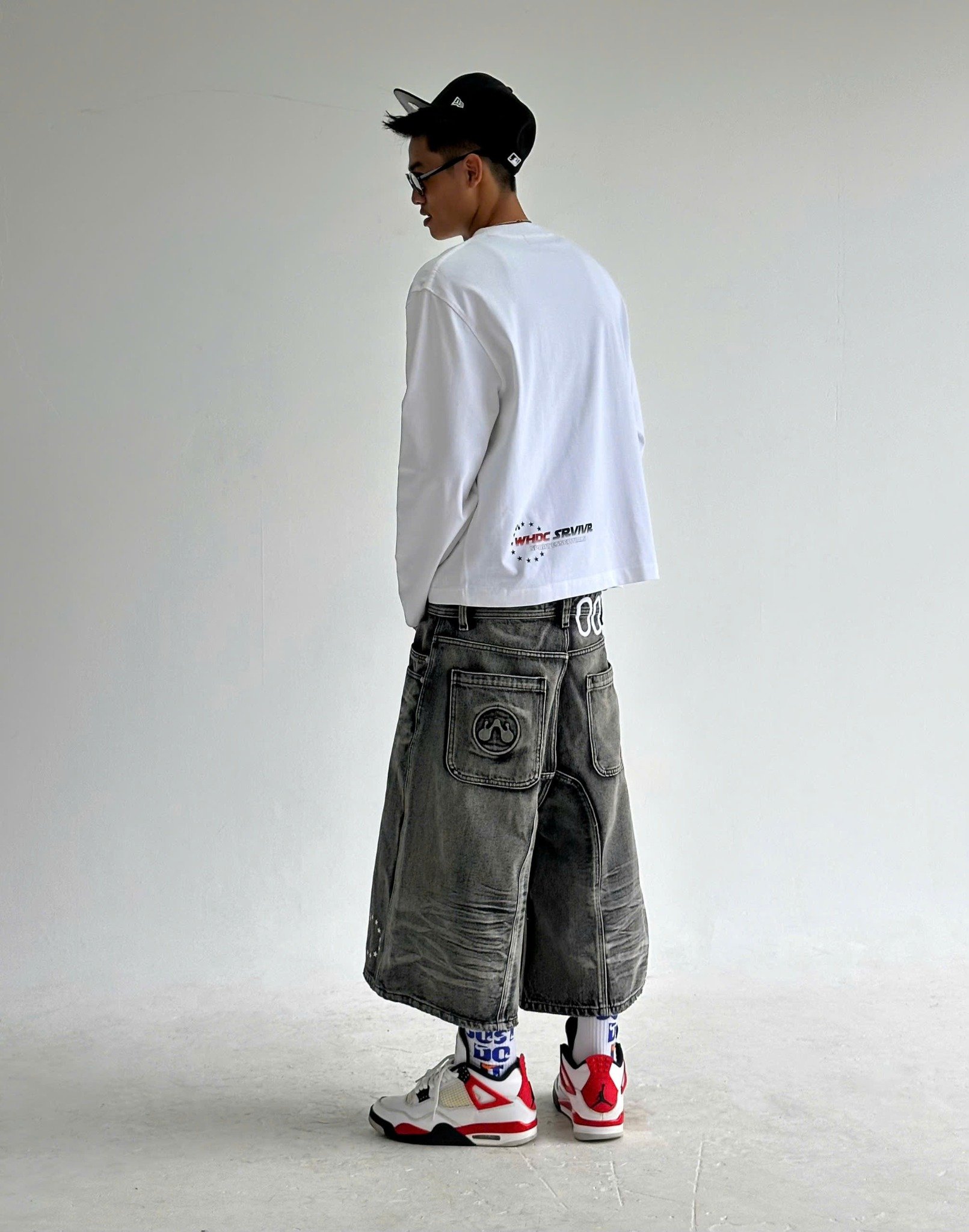 WHDC SRVIVR WASHED BAGGY DENIM SHORTS IN BLACK