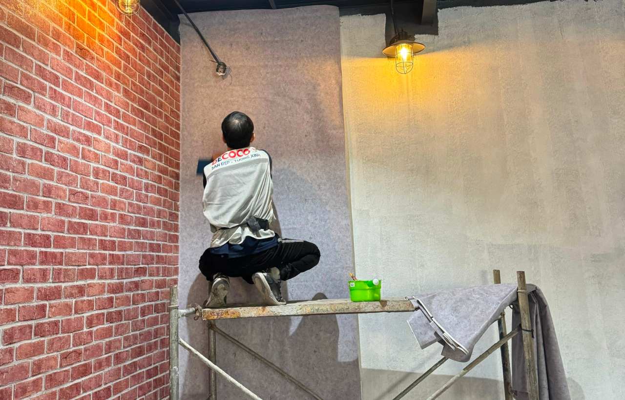 Wallpaper installation in Hanoi City with brick and concrete texture design