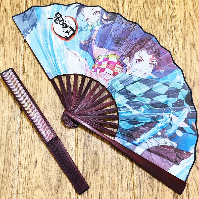 Quạt Kimetsu no Yaiba Thanh gươm diệt quỷ nan 31cm cầm tay in hình anime chibi 2 mặt