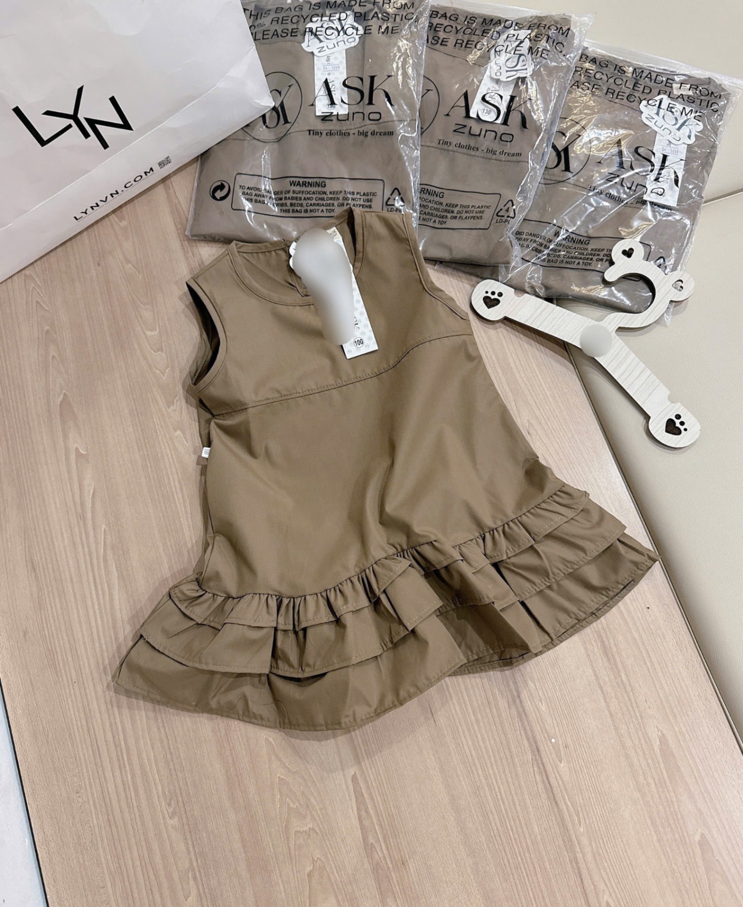 Váy tone nâu bé gái(6/26kg)