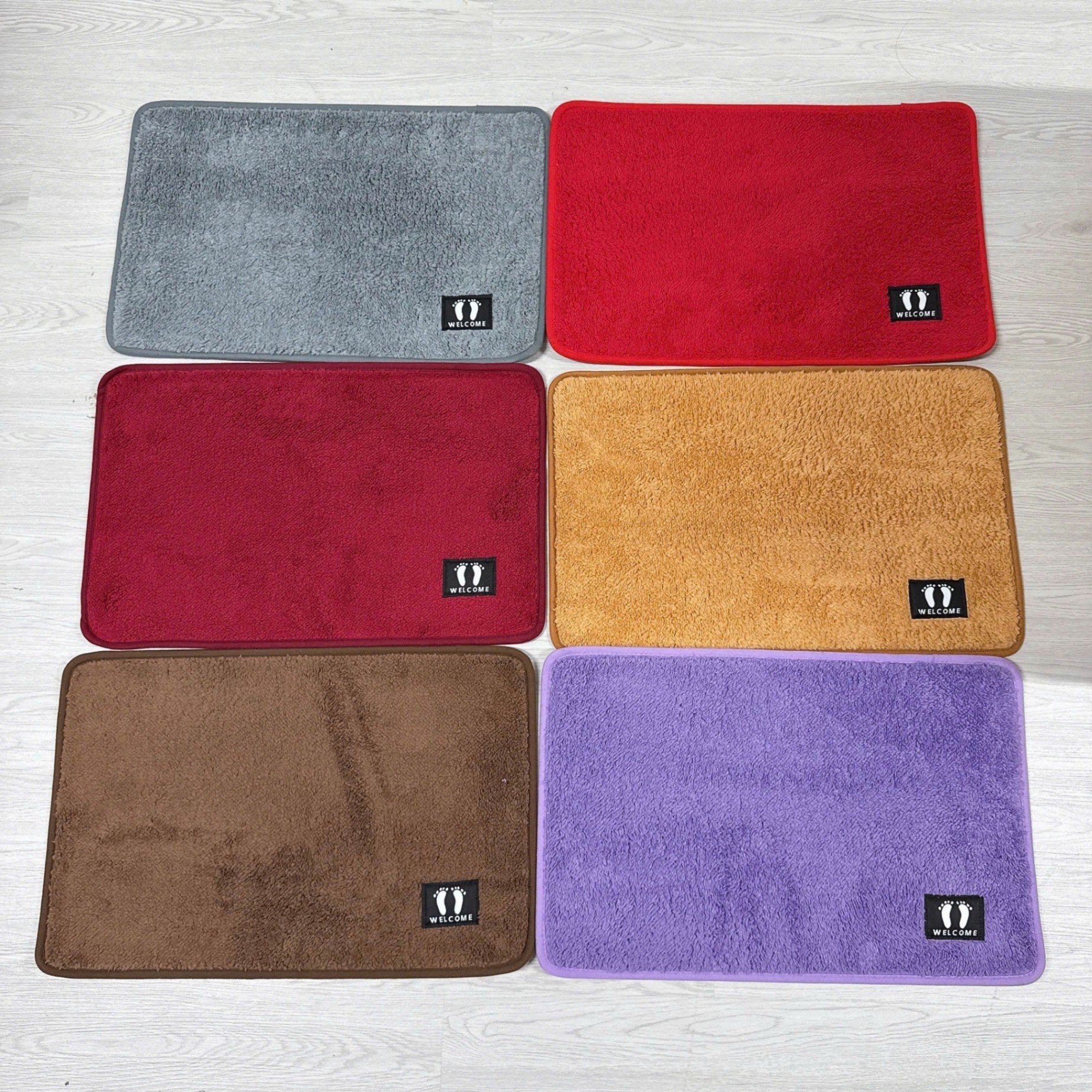 [100] Thảm Chân Vải Mềm LOGO CHÂN 58x38
