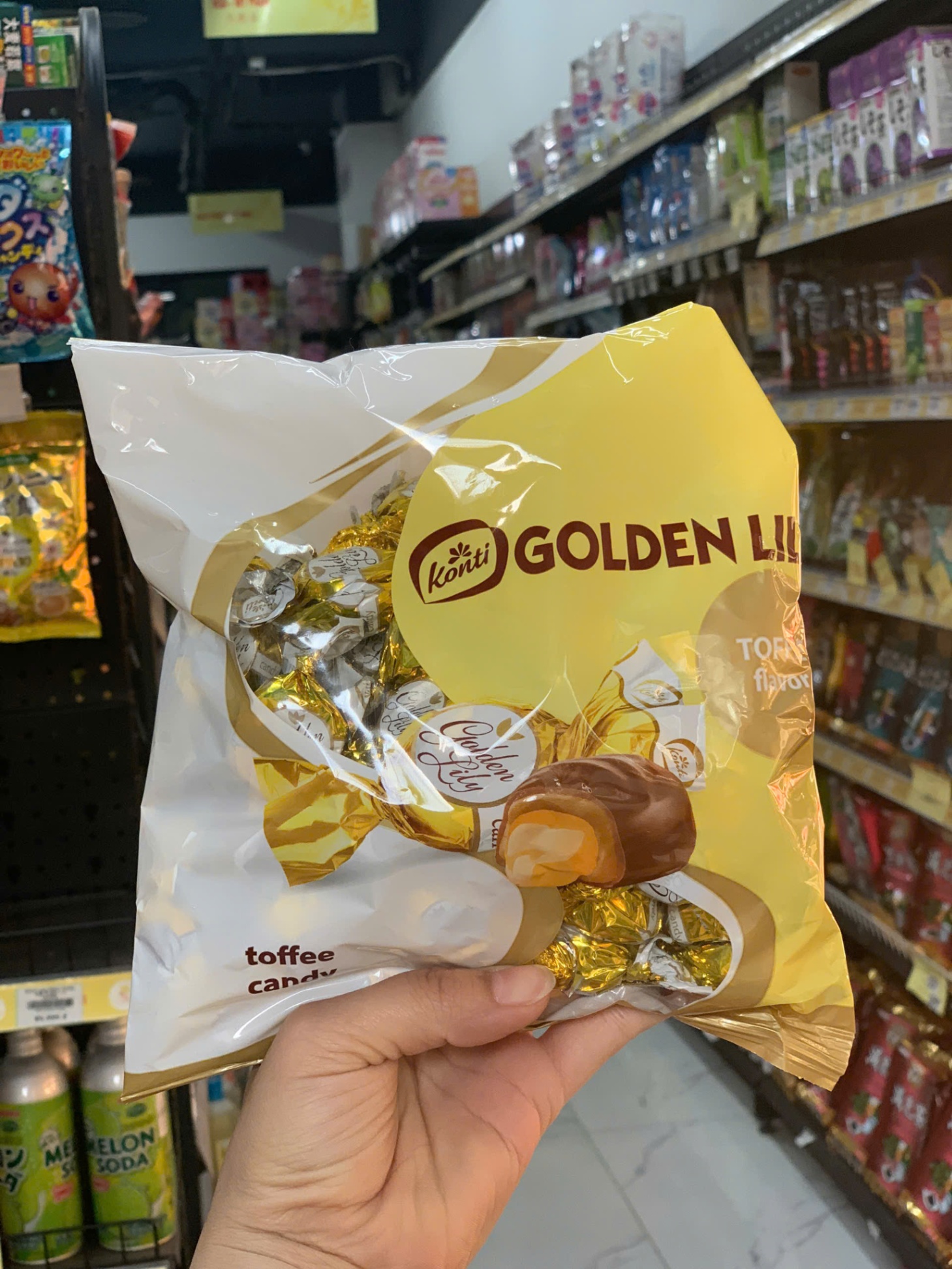 Kẹo sôcôla Kangji Golden Lily bơ cứng Sữa đặc Nga 500g