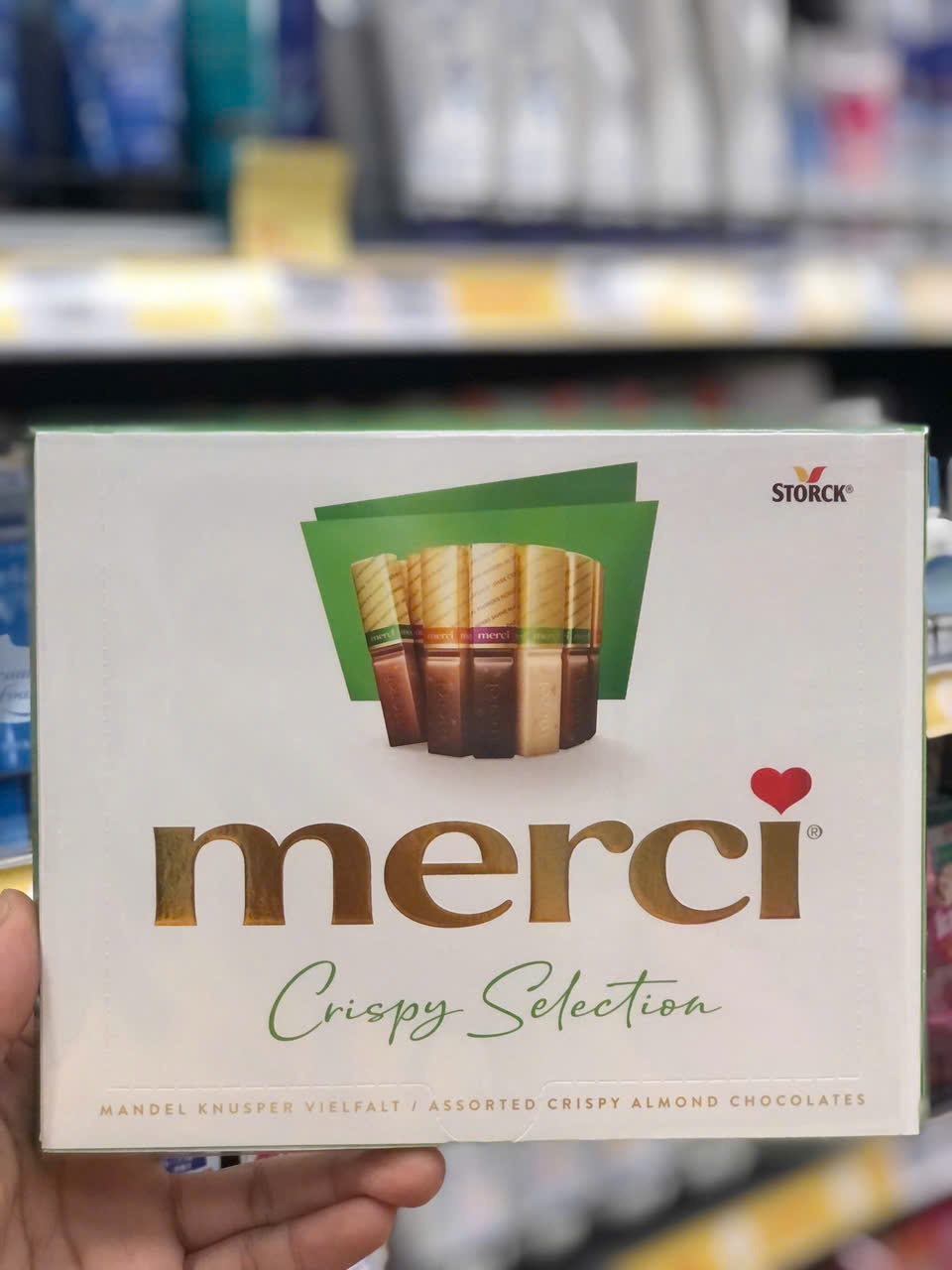 Socola hạnh nhân giòn tổng tộp Storck merci Finest Selection 250g xanh