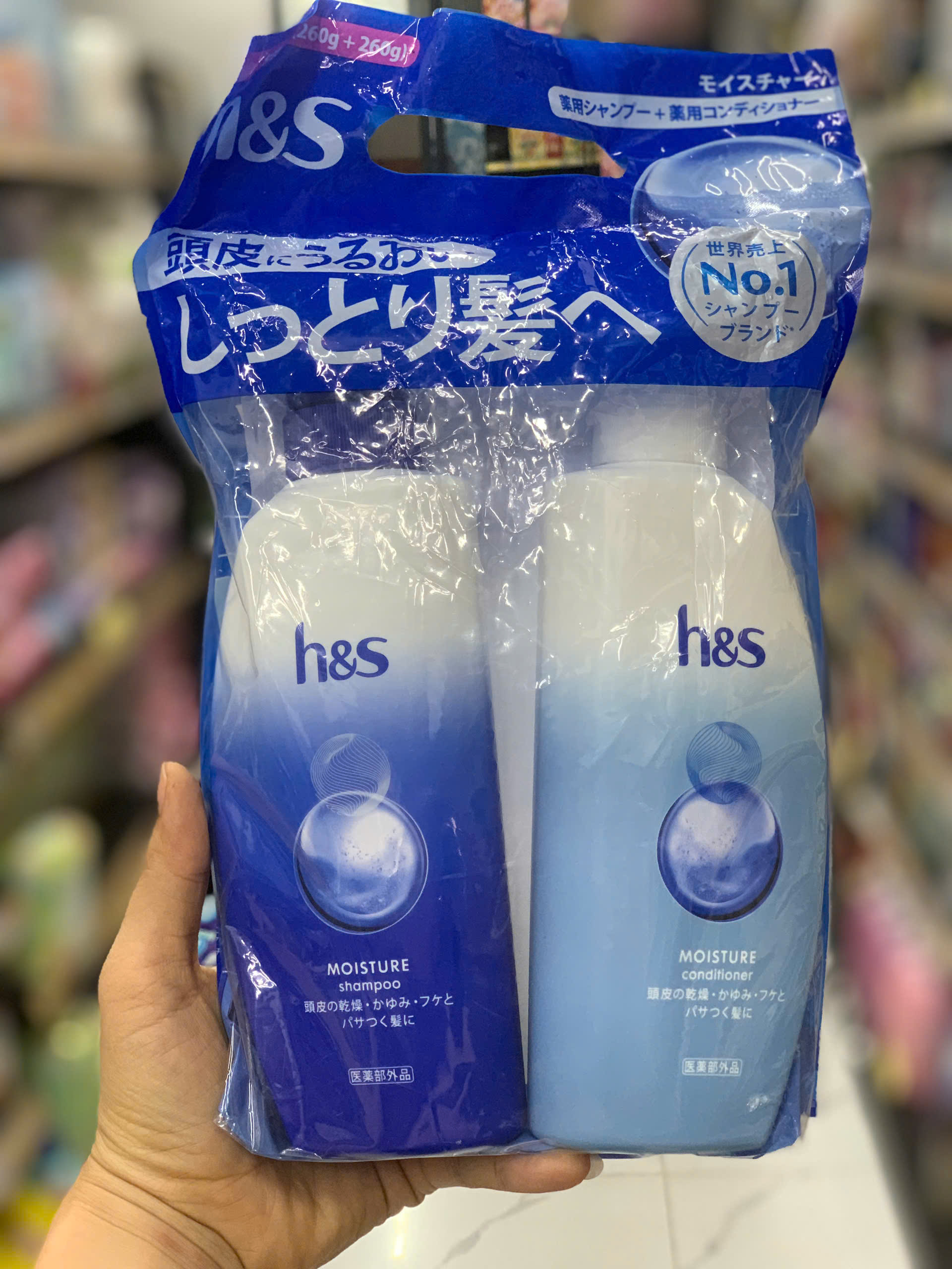 Bộ gội xả trị gàu và ngứa da đầu HS Moisture xanh (260g + 260g)