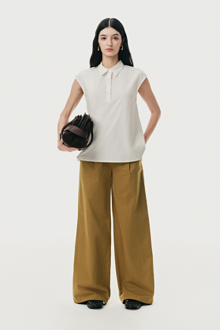 Áo sơ mi vai chờm thân sau xếp vạt