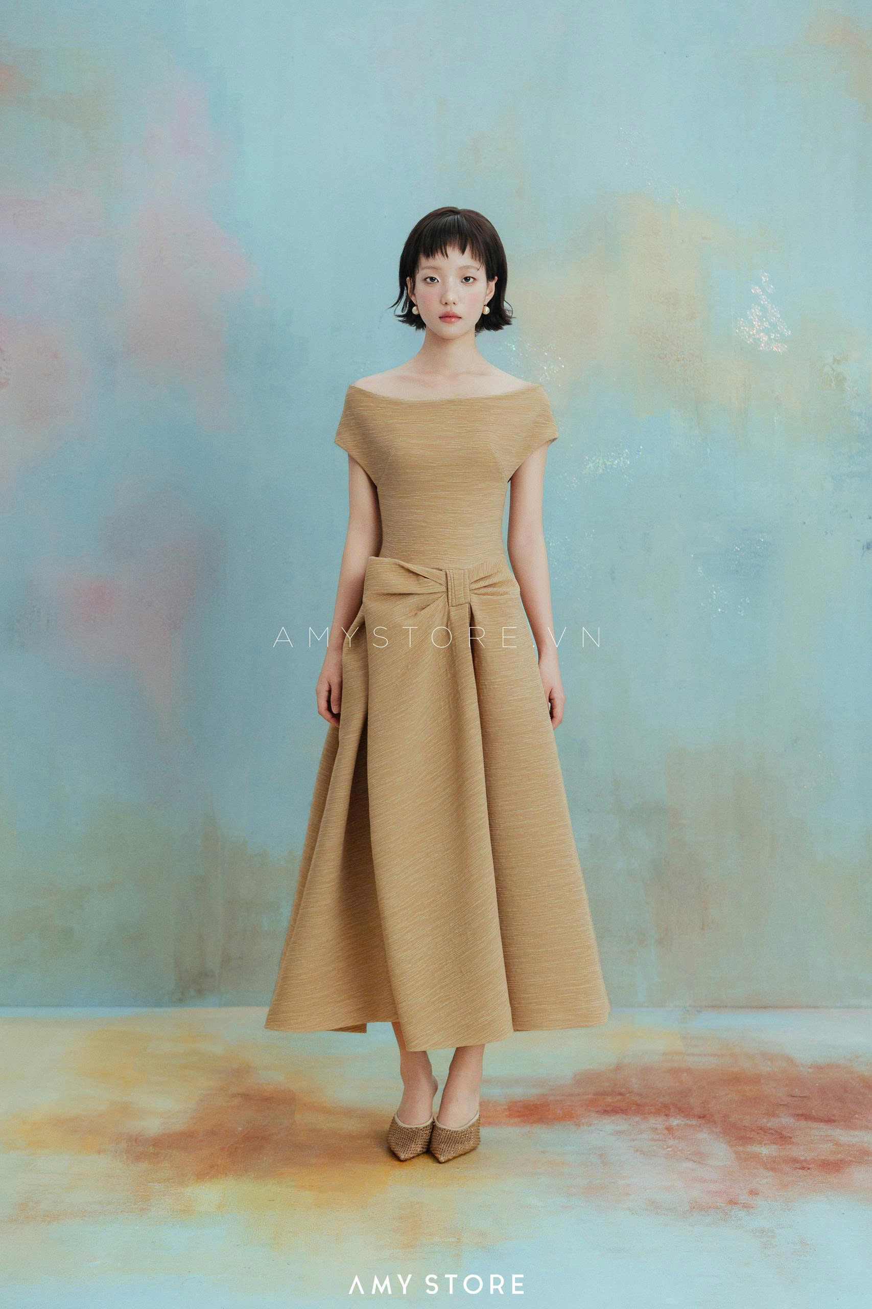 Đầm trễ vai xếp nơ lệch