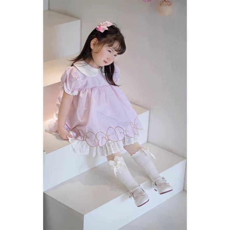 VÁY SỌC HỒNG CỔ TRẮNG TRÒN XK CHO BÉ