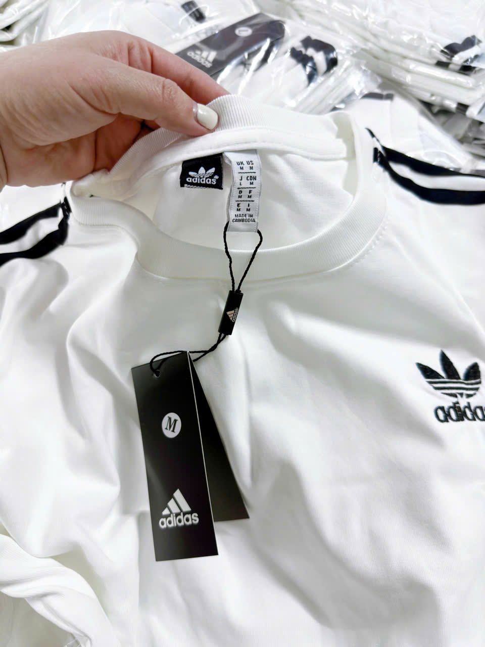 Áo phông trắng sọc tay #80k Còn 10c sz s m