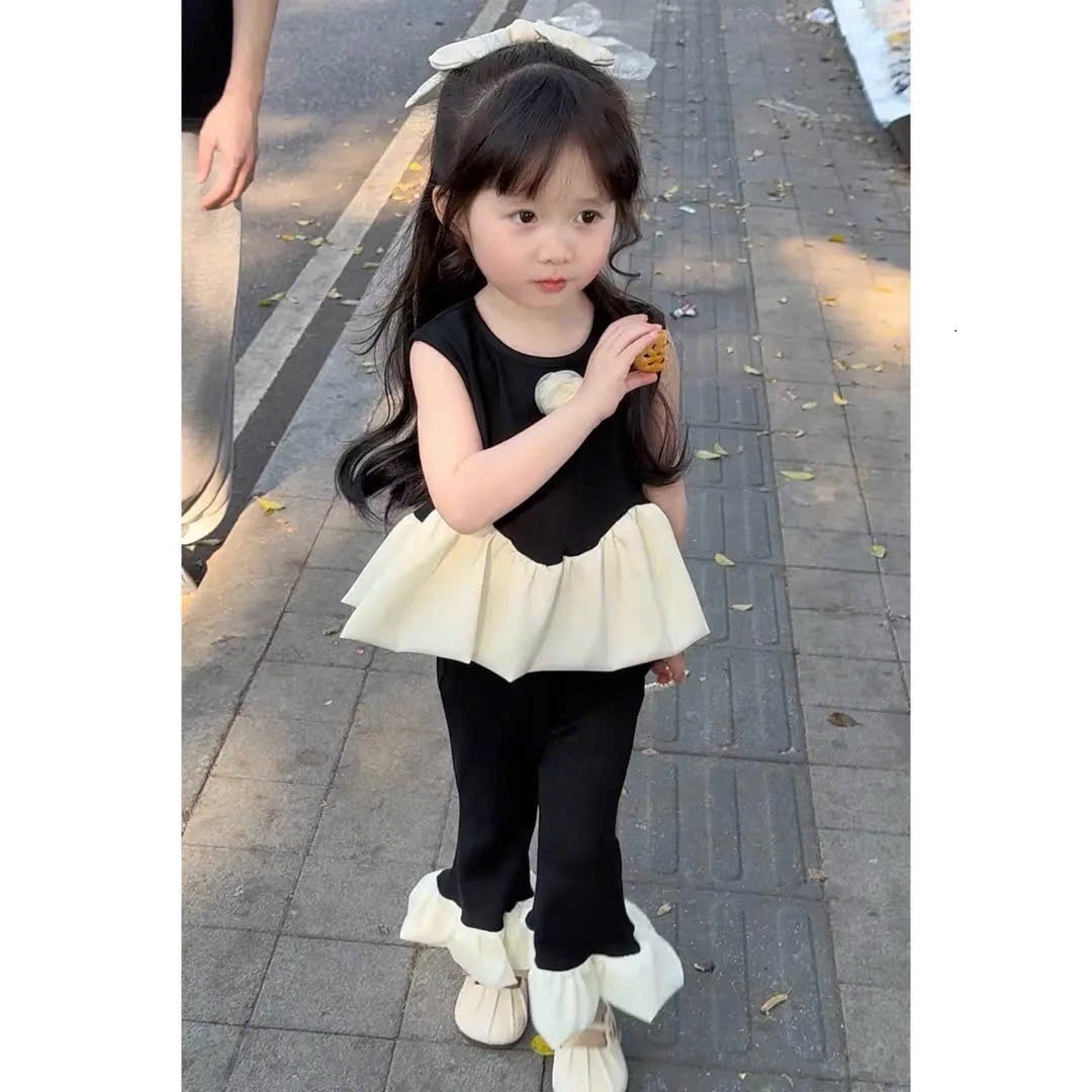 Bộ áo đen quần loe bé gái mk
