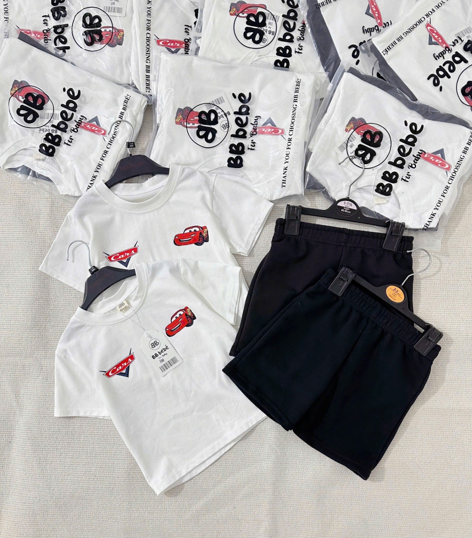 Seo VNXK: Bộ cotton ô tô trắng quần đen Còn 90- 100-120 #64k/bộ