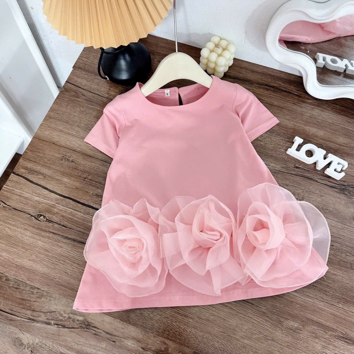 Váy chữ a xuông đính hoa bé gái
