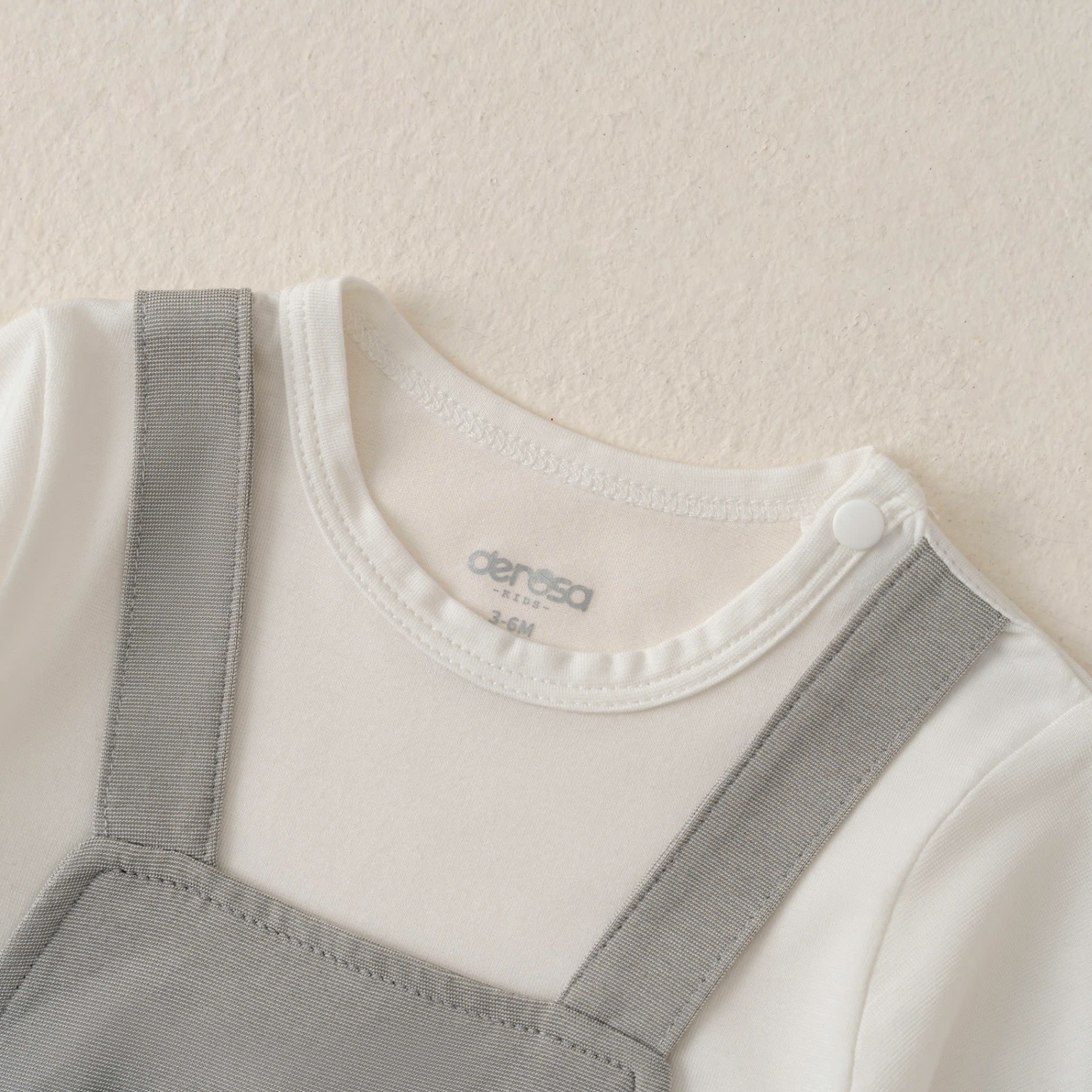 Body dài tay phối yếm BT(3-12M) Nâu