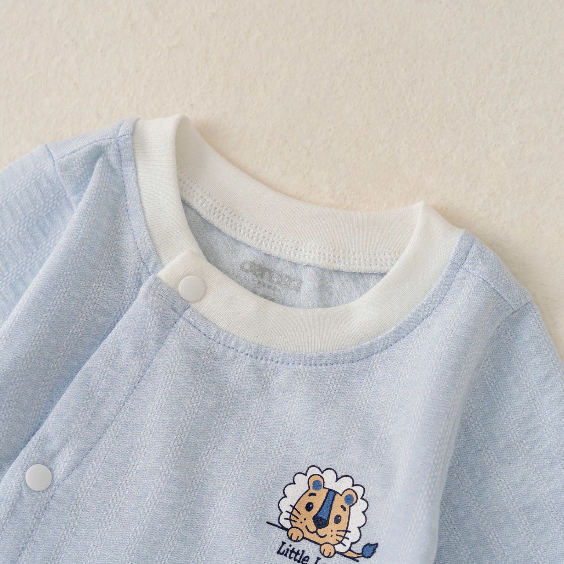Body cài lệch dài tay BT (0-6M) Nâu