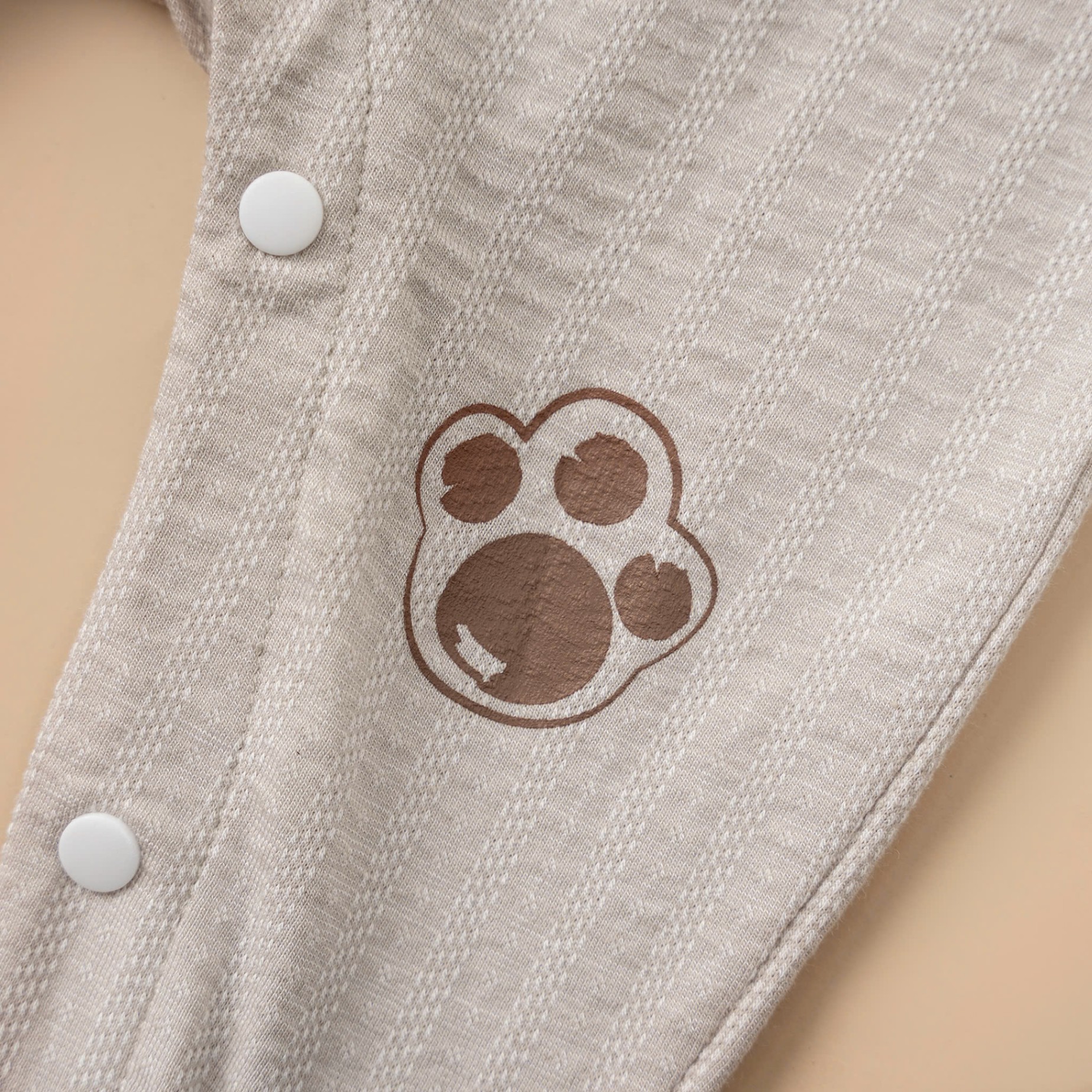 Body cài lệch dài tay BT (0-6M) Nâu