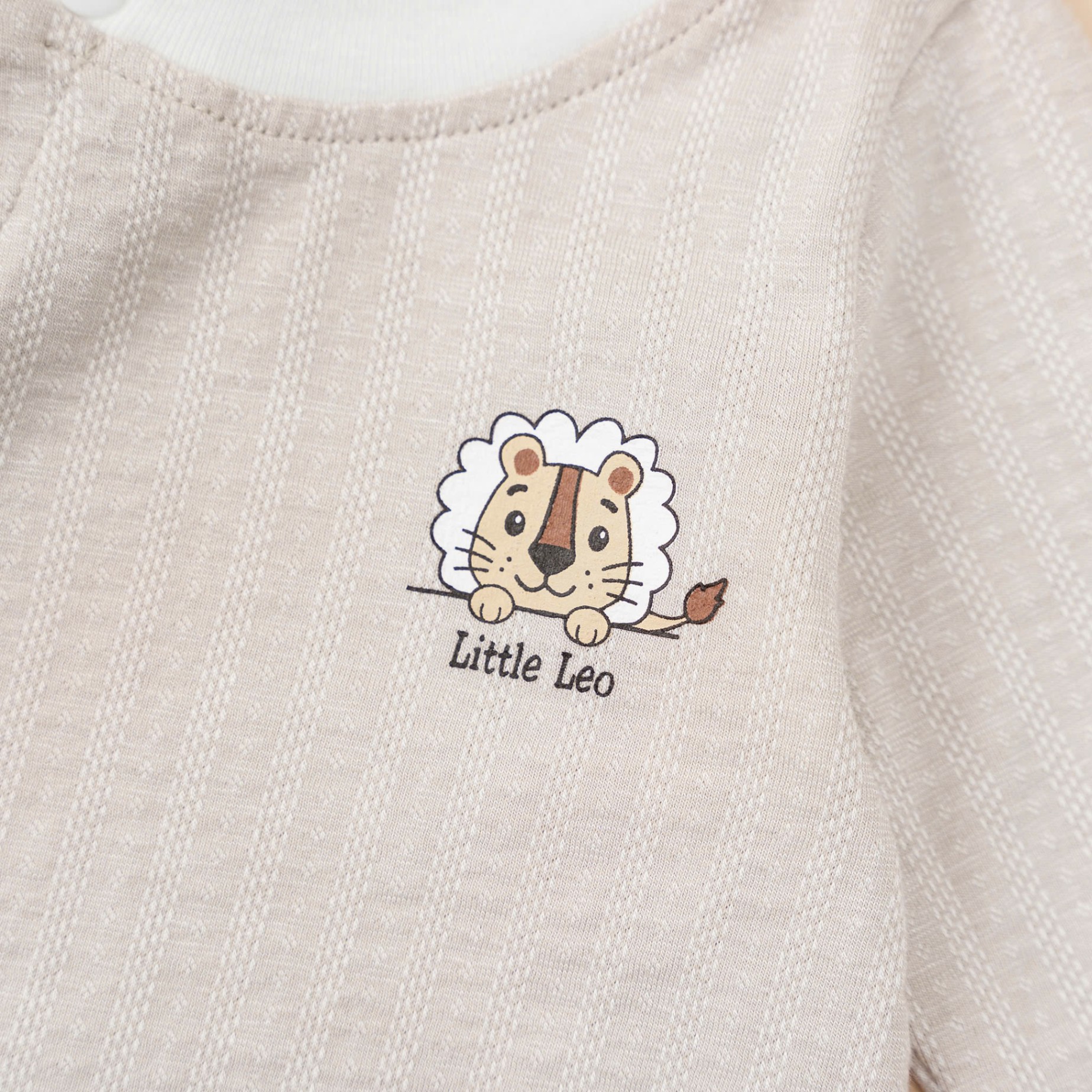 Body cài lệch dài tay BT (0-6M) Nâu