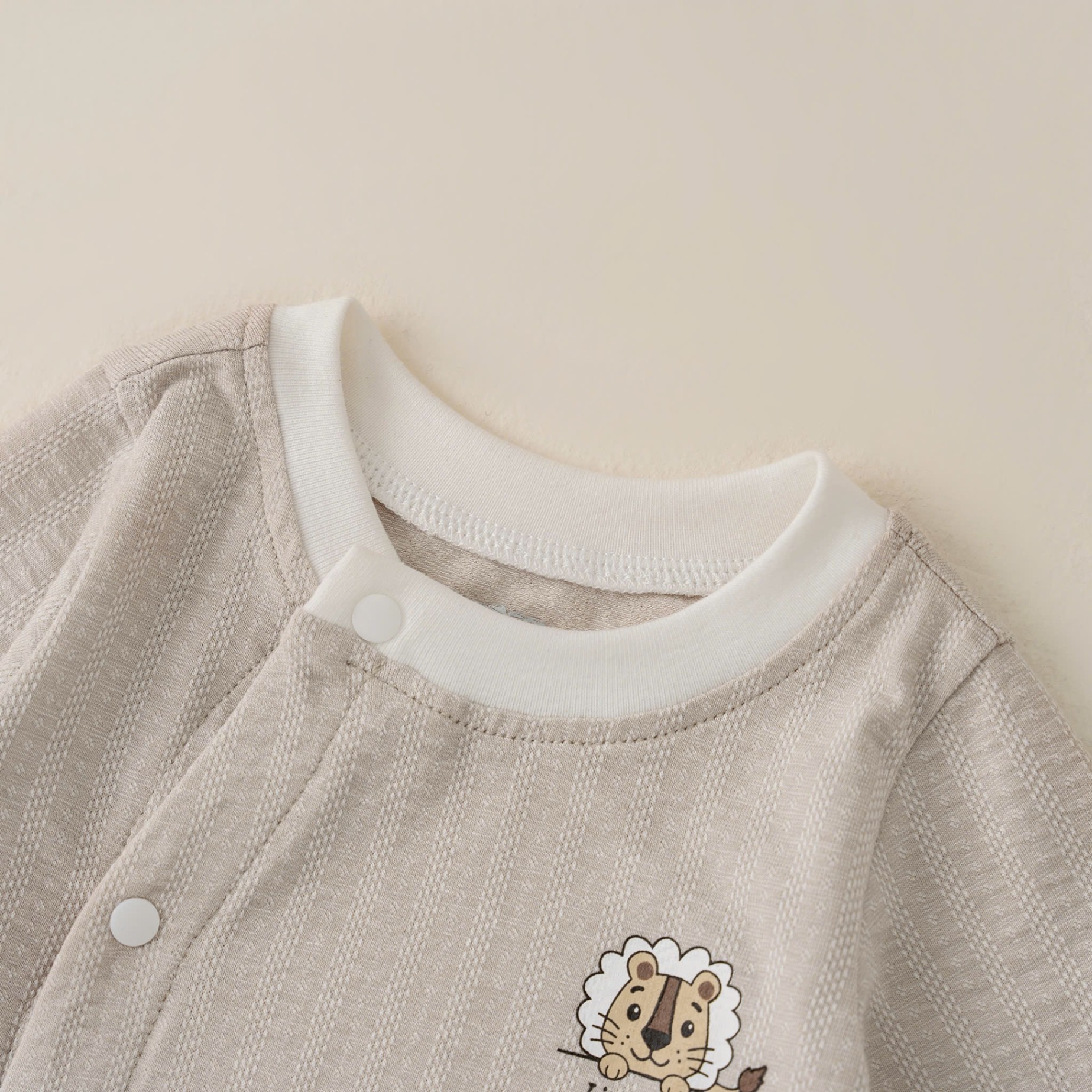 Body cài lệch dài tay BT (0-6M) Nâu
