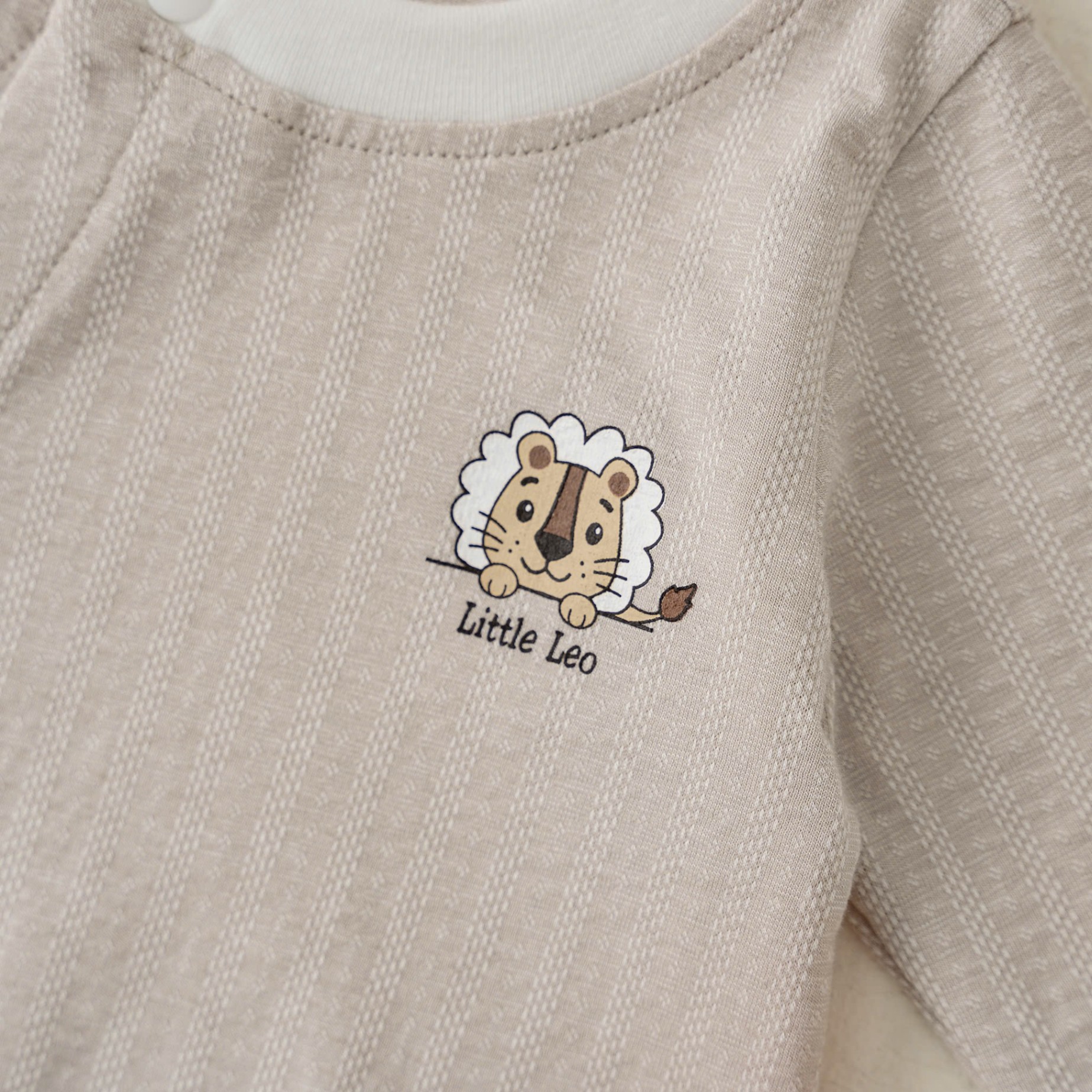 Body cài lệch dài tay BT (0-6M) Nâu