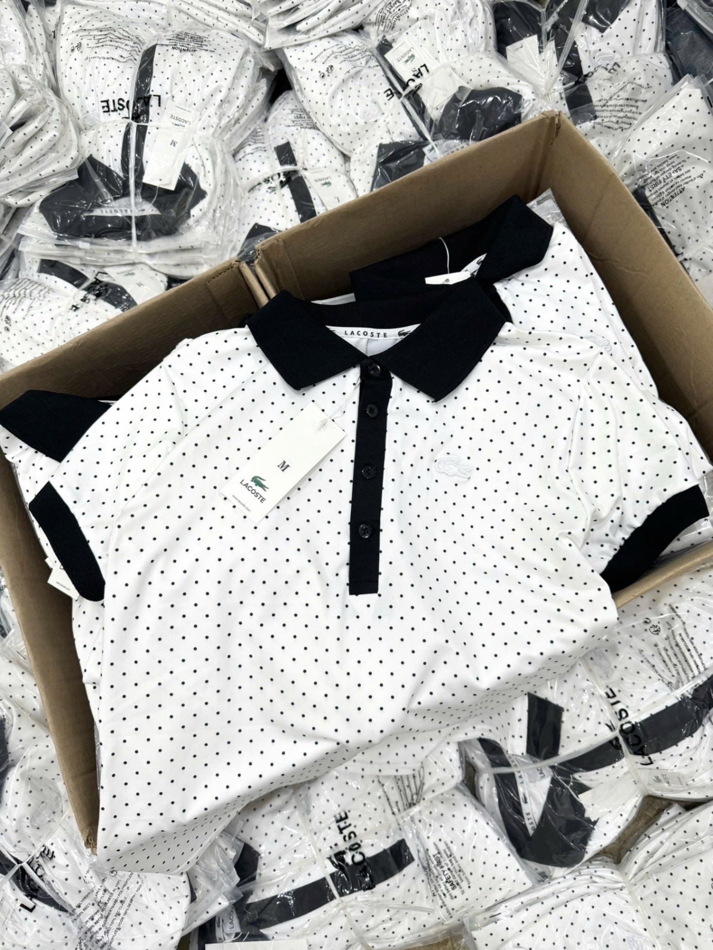 A18047 Áo polo lăc cột chấm bi