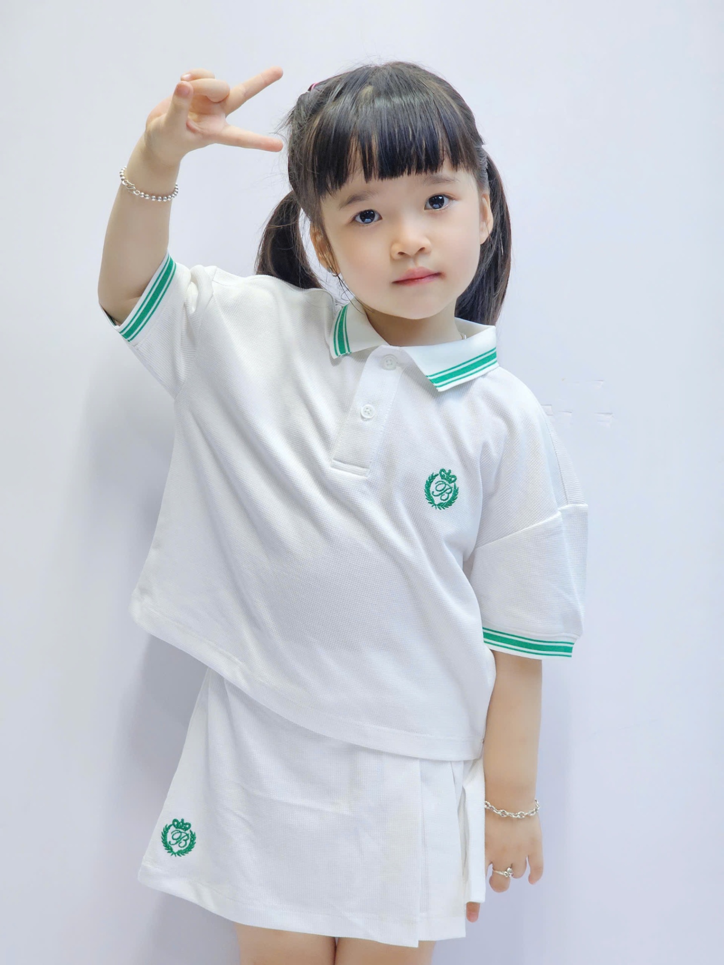 Sét cho bé gái, áo polo dáng lửng, chân váy có lớp lót quần, 2 màu