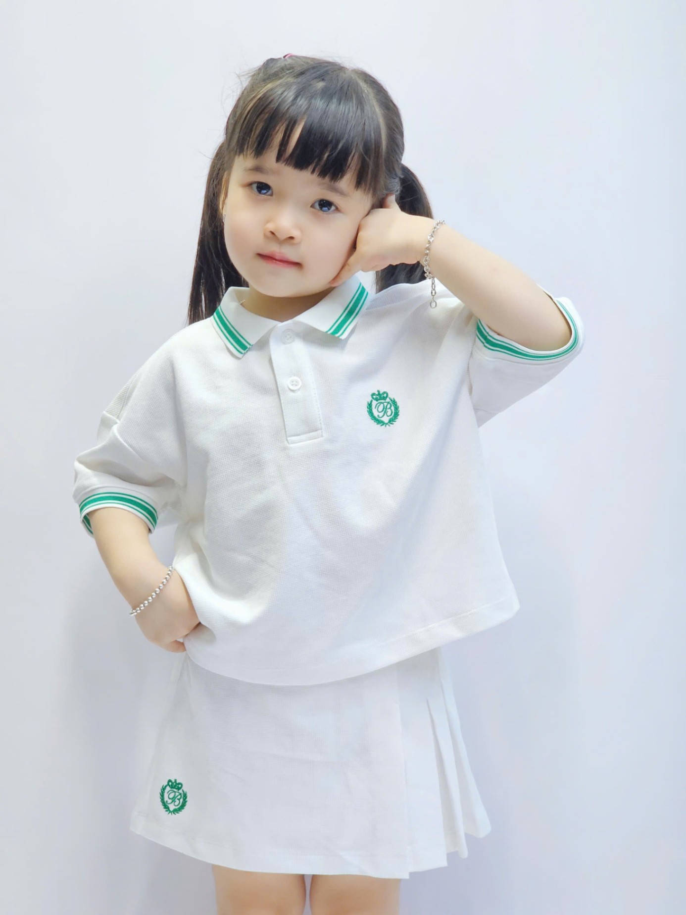 Sét cho bé gái, áo polo dáng lửng, chân váy có lớp lót quần, 2 màu