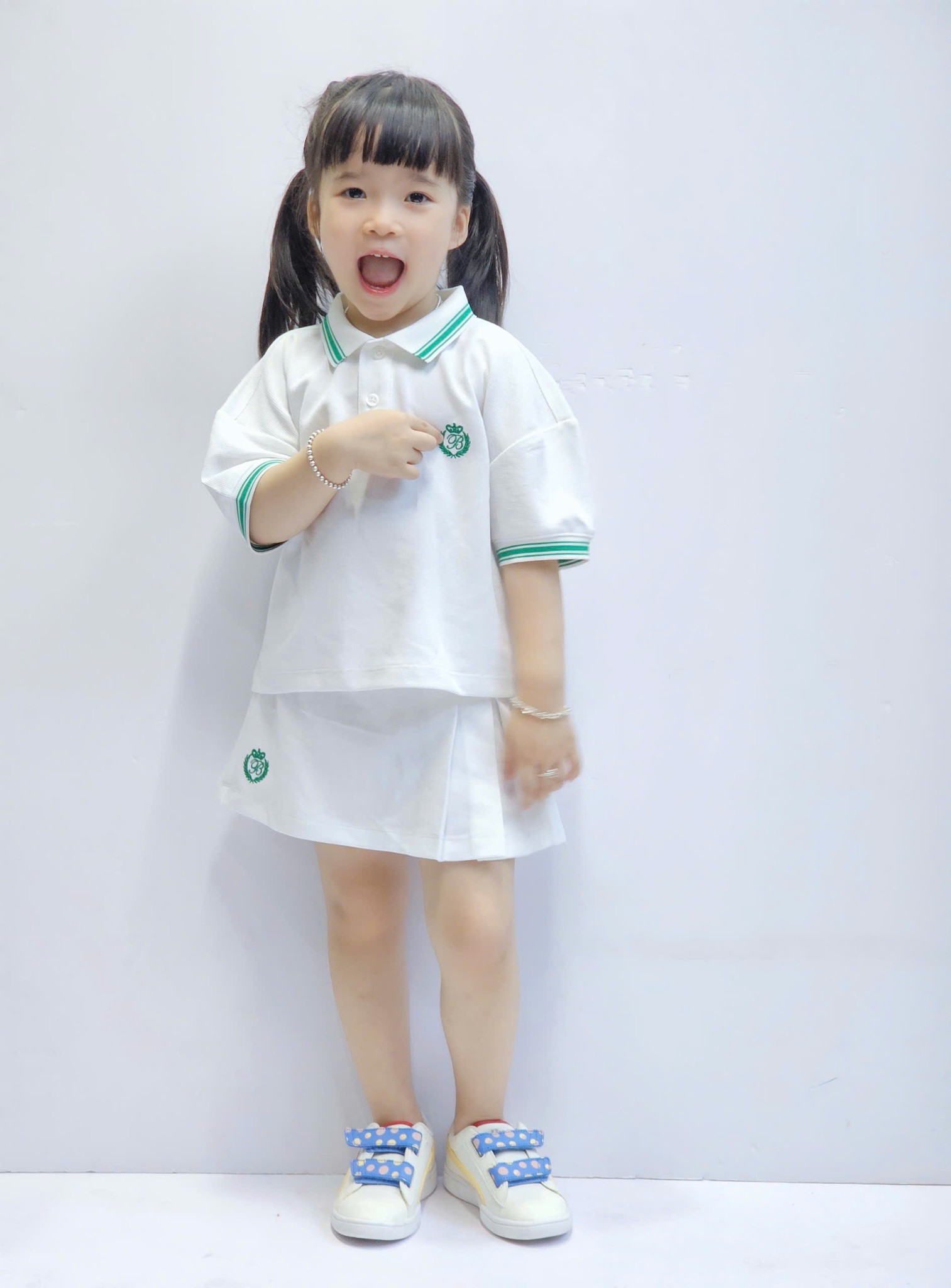Sét cho bé gái, áo polo dáng lửng, chân váy có lớp lót quần, 2 màu