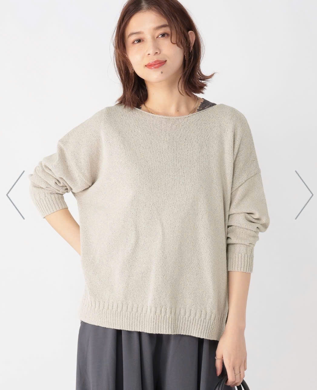 Áo len sợi đan, cổ thuyền, dáng oversize. xẻ hông, vạt lệch trước sau