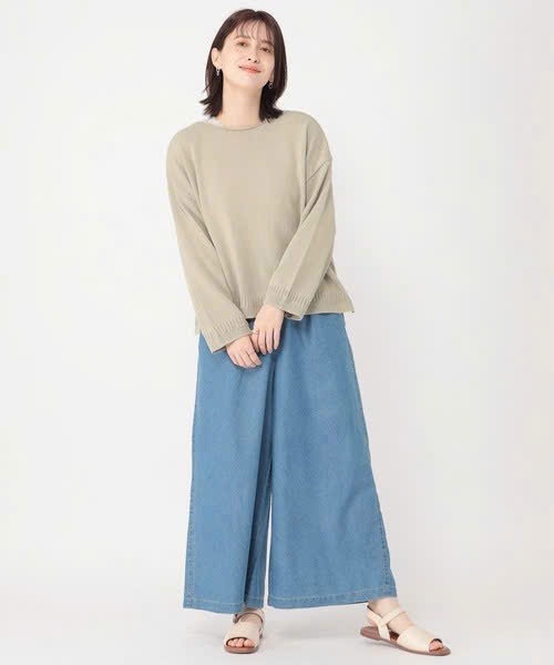 Áo len sợi đan, cổ thuyền, dáng oversize. xẻ hông, vạt lệch trước sau
