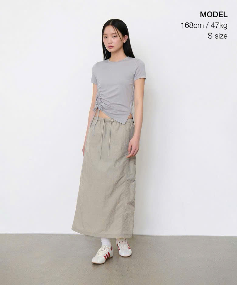 Chân váy gió, dáng dài, cạp chun, xẻ sau