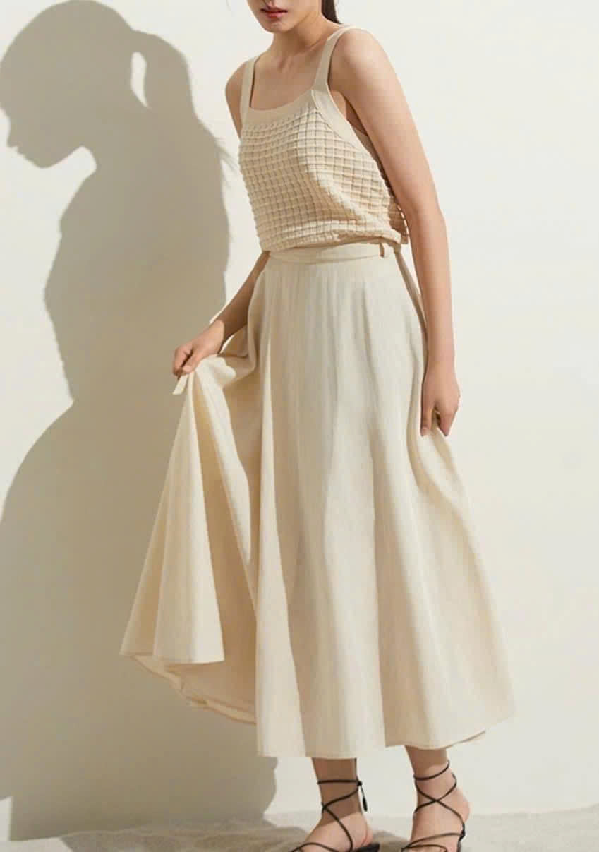 Chân váy midi, vải lụa rayon, dáng xòe, đính cúc hông, dây đai eo