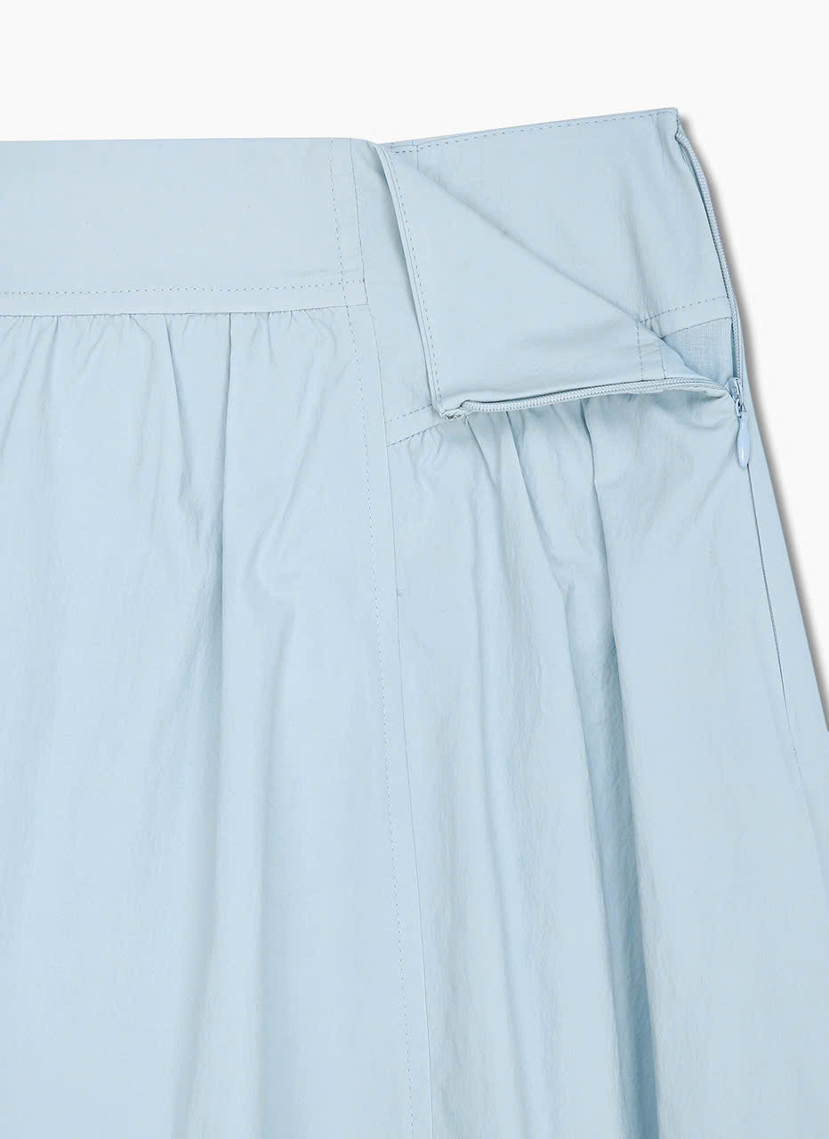Chân váy midi xòe, bèo nhún không đối xứng