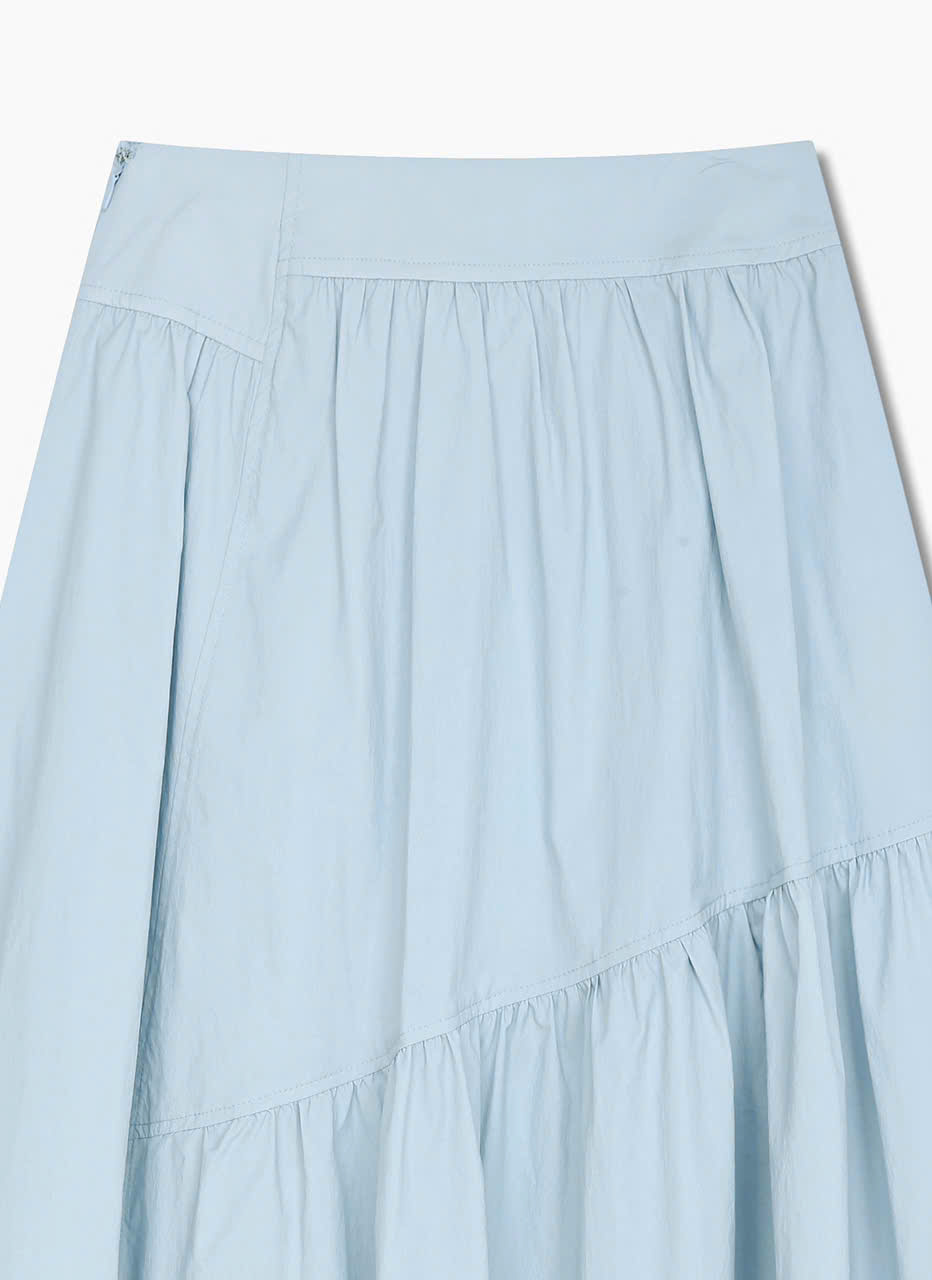 Chân váy midi xòe, bèo nhún không đối xứng