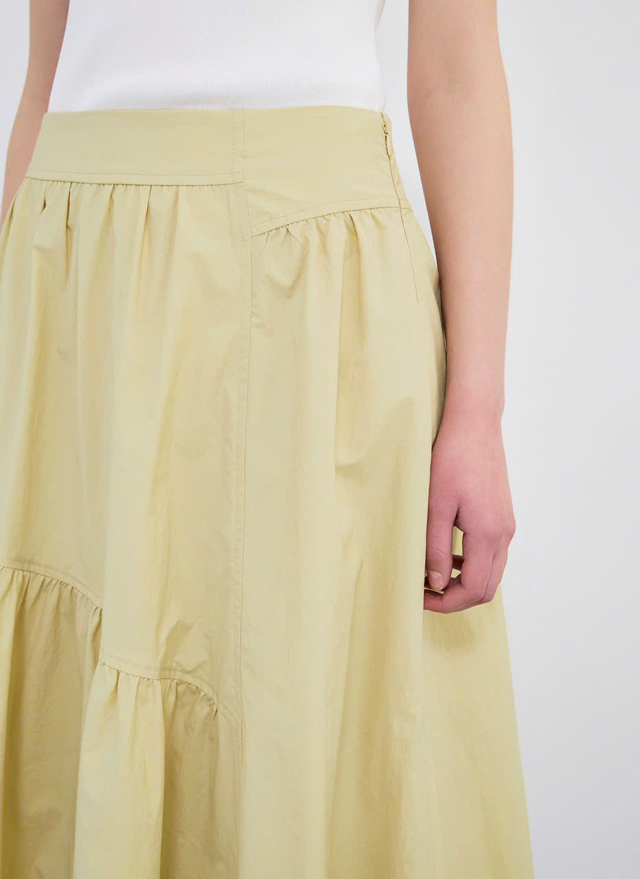 Chân váy midi xòe, bèo nhún không đối xứng