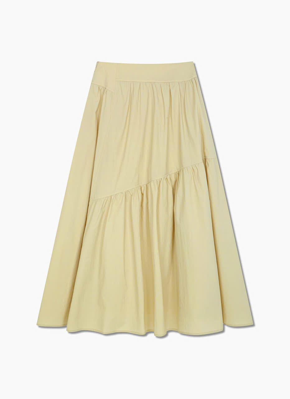 Chân váy midi xòe, bèo nhún không đối xứng