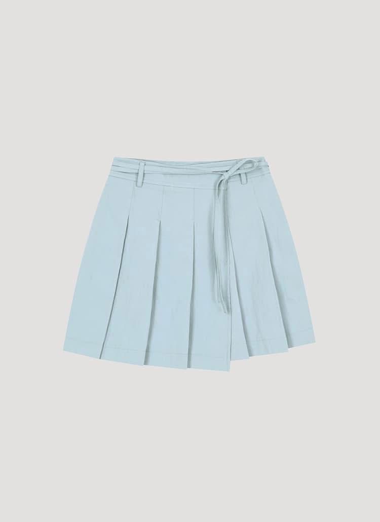 Chân váy xếp ly kaki, có đỉa, vạt lệch, dây đai